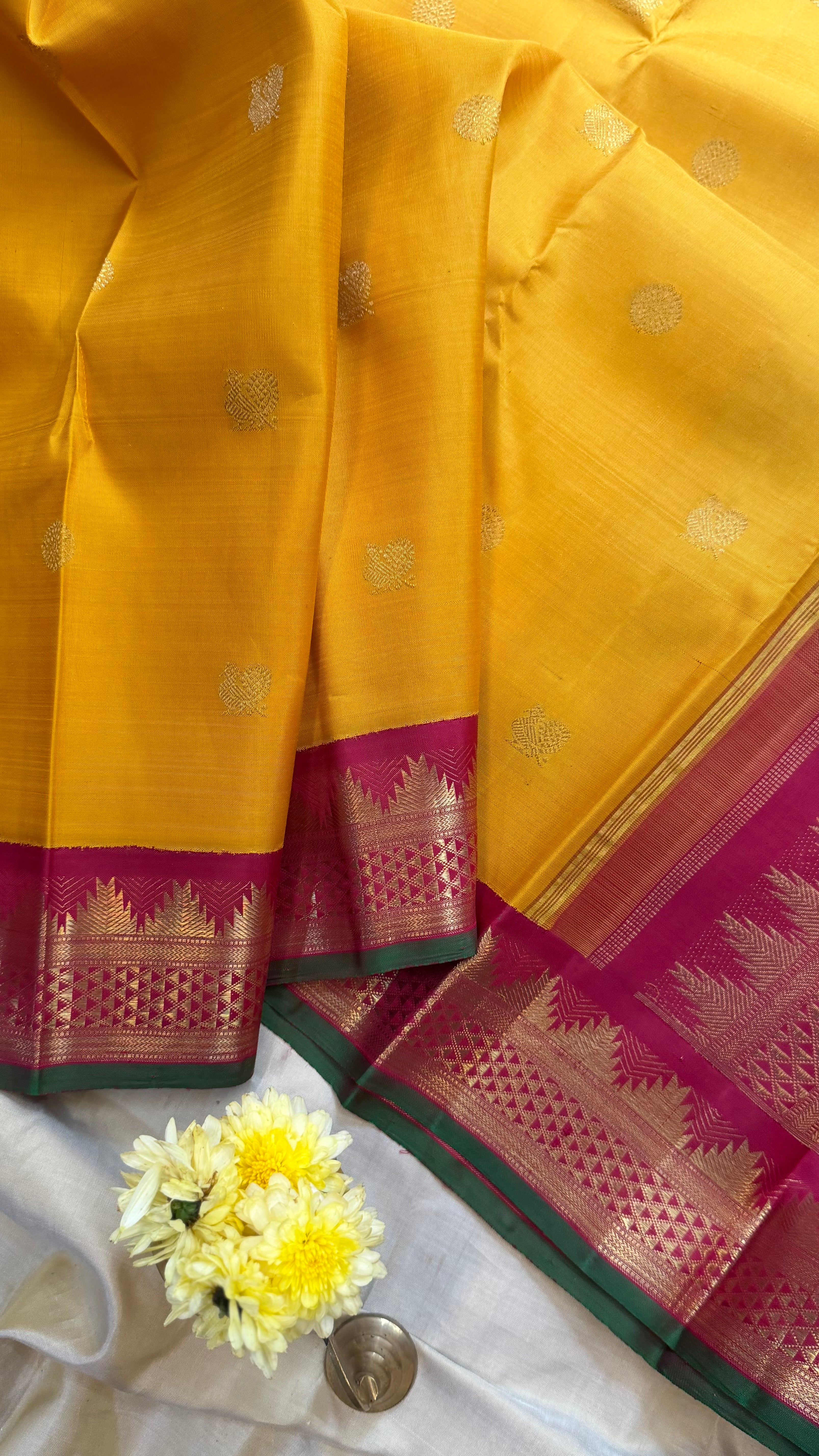 Golden yellow and araku araimadam and temple border kai korvai/ kanjipuram silk