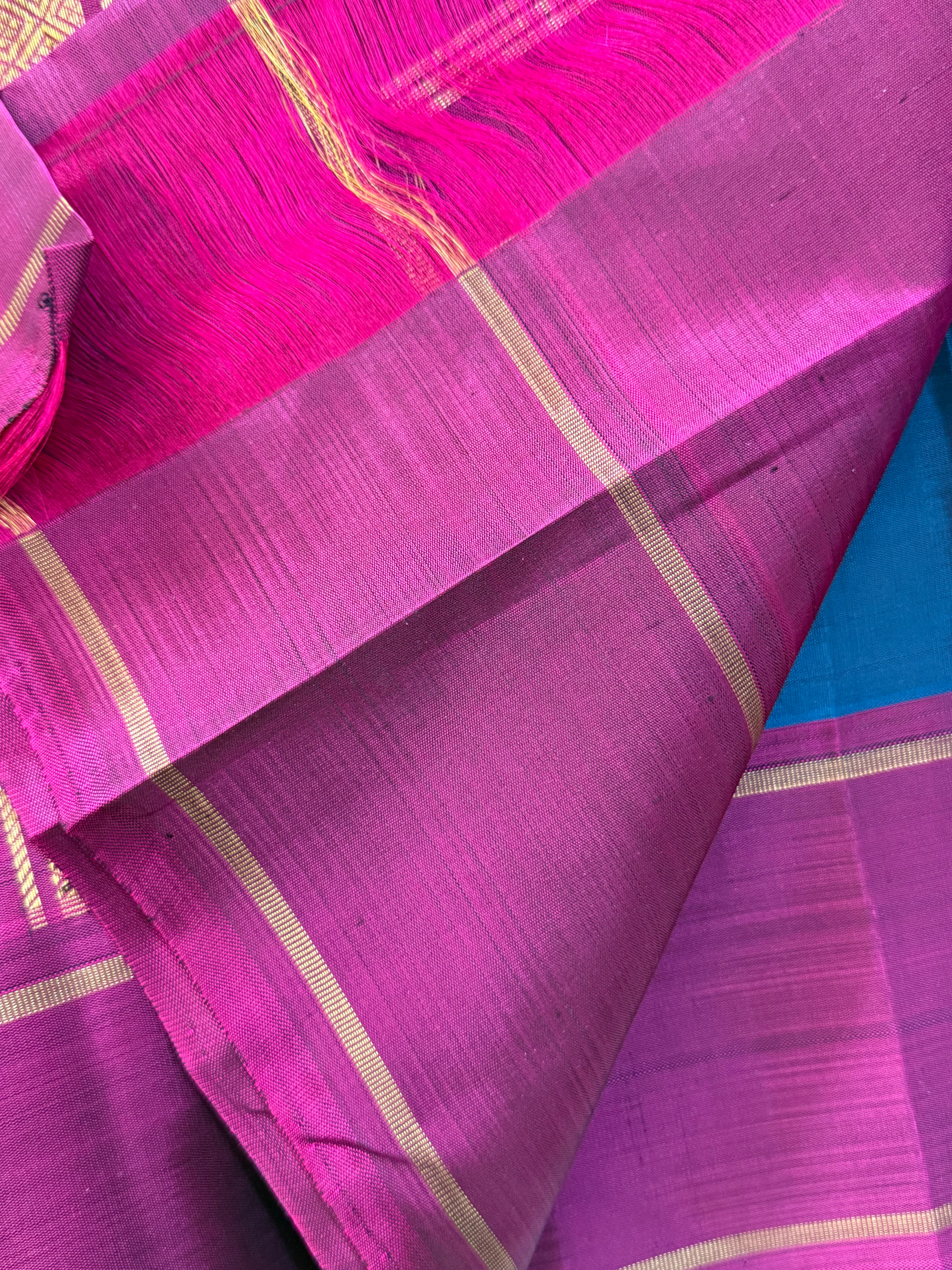 Peacock blue yazhi and chakram butta / Kanjipuram silk