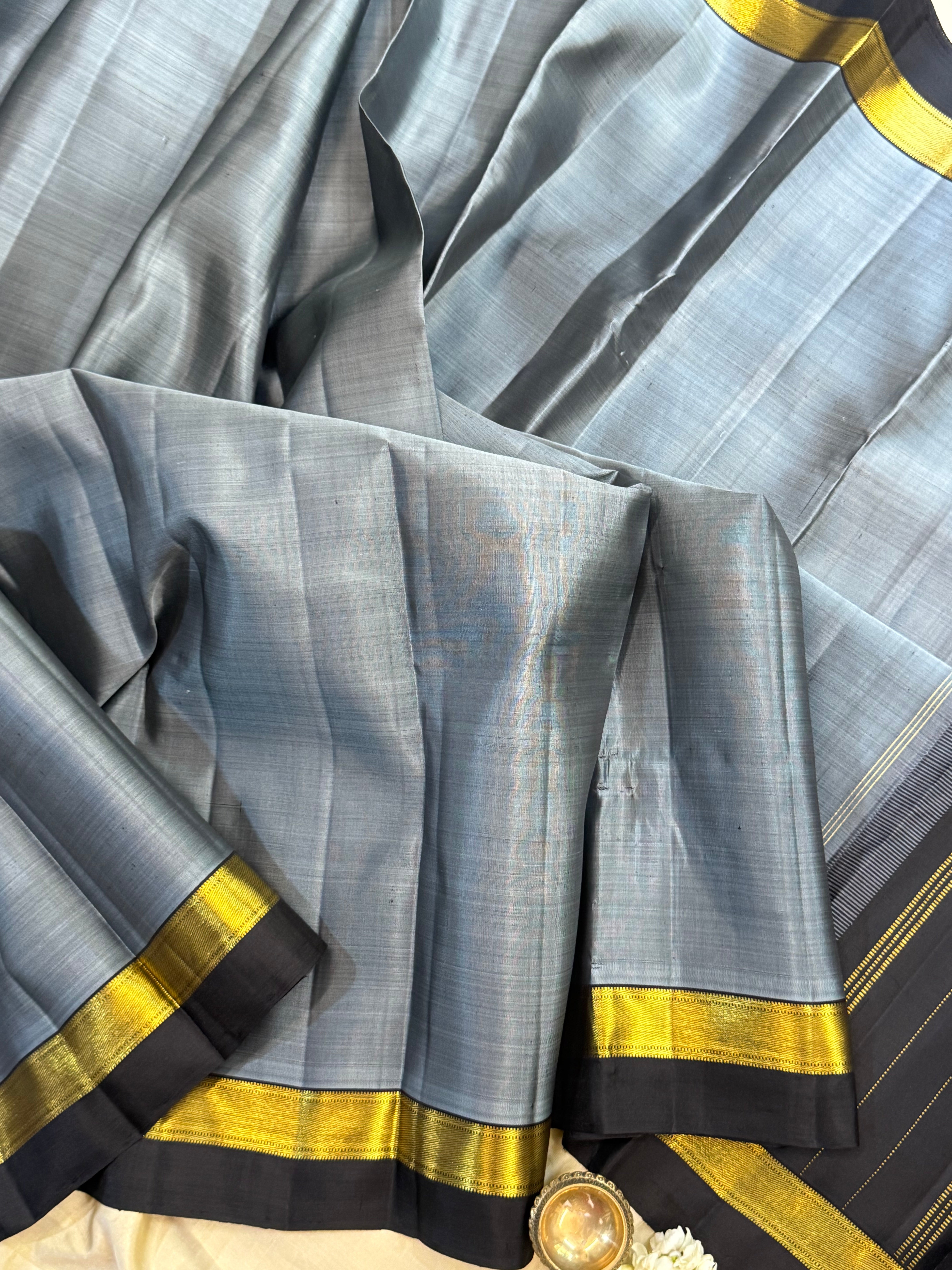 Bluish grey and black kaal erangina border/ Arani silk