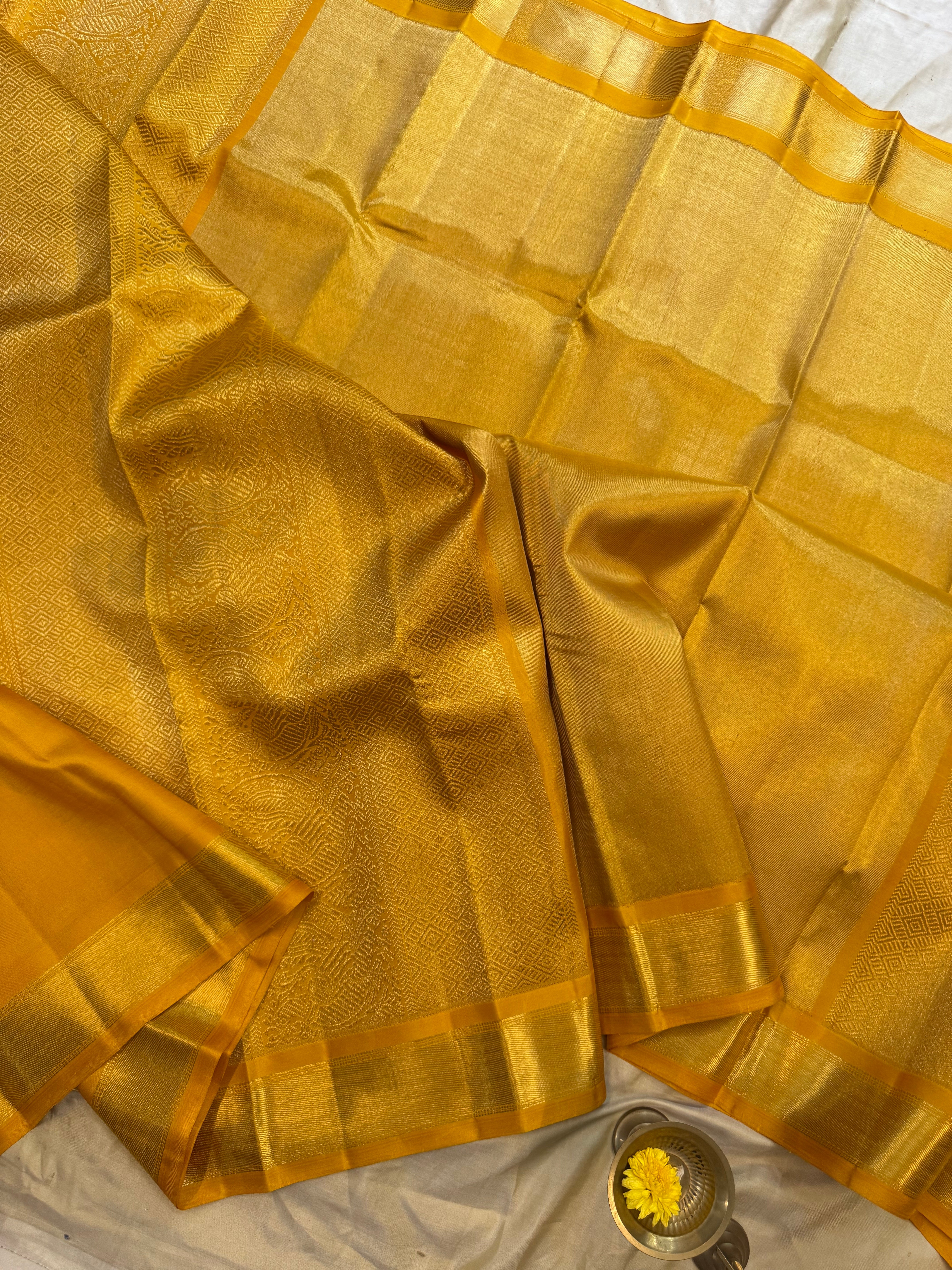 Golden mustard yellow berhampuri style long Palla kanjipuram silk.