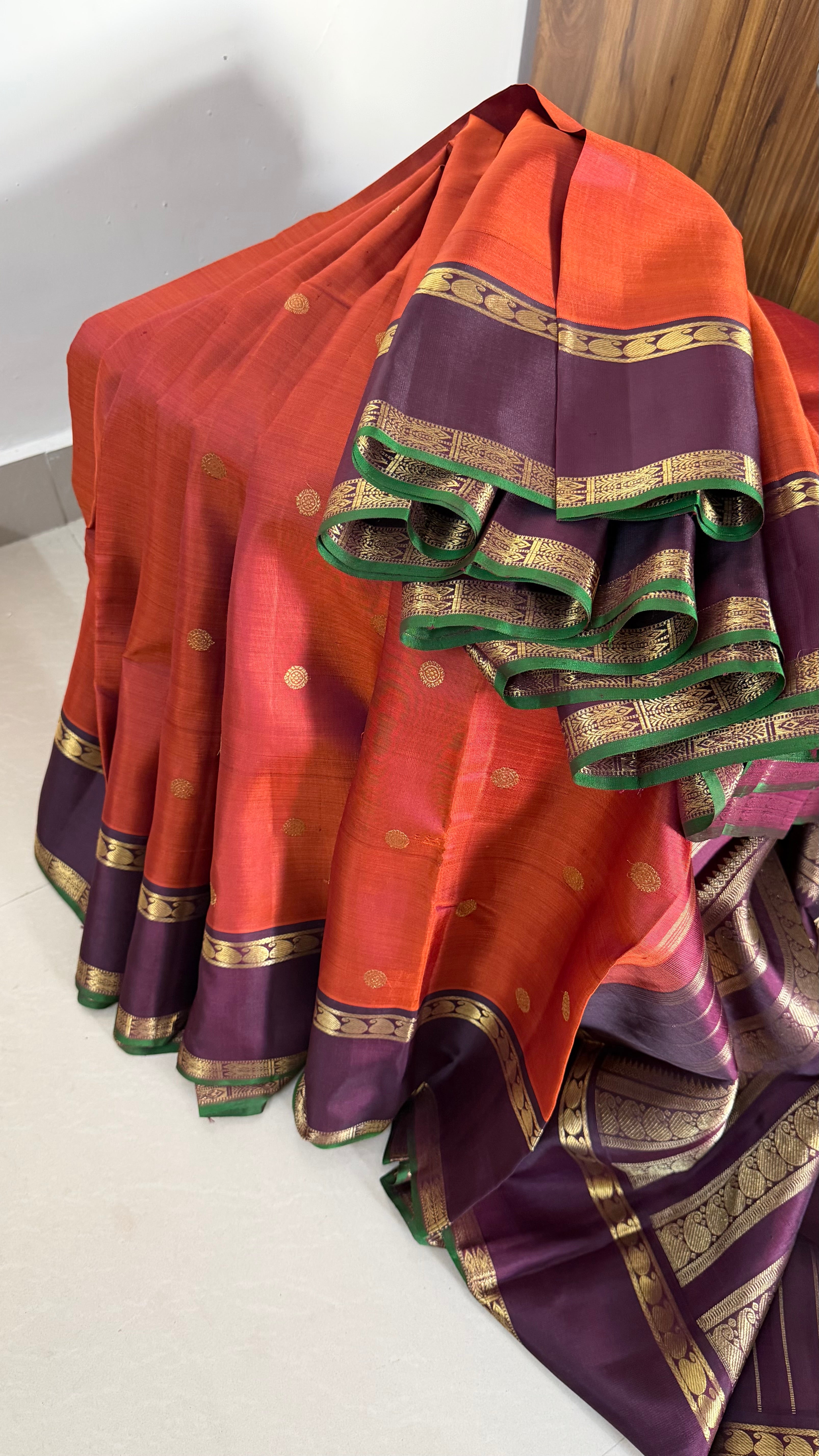 Rust with Paaku border /kanjipuram silk