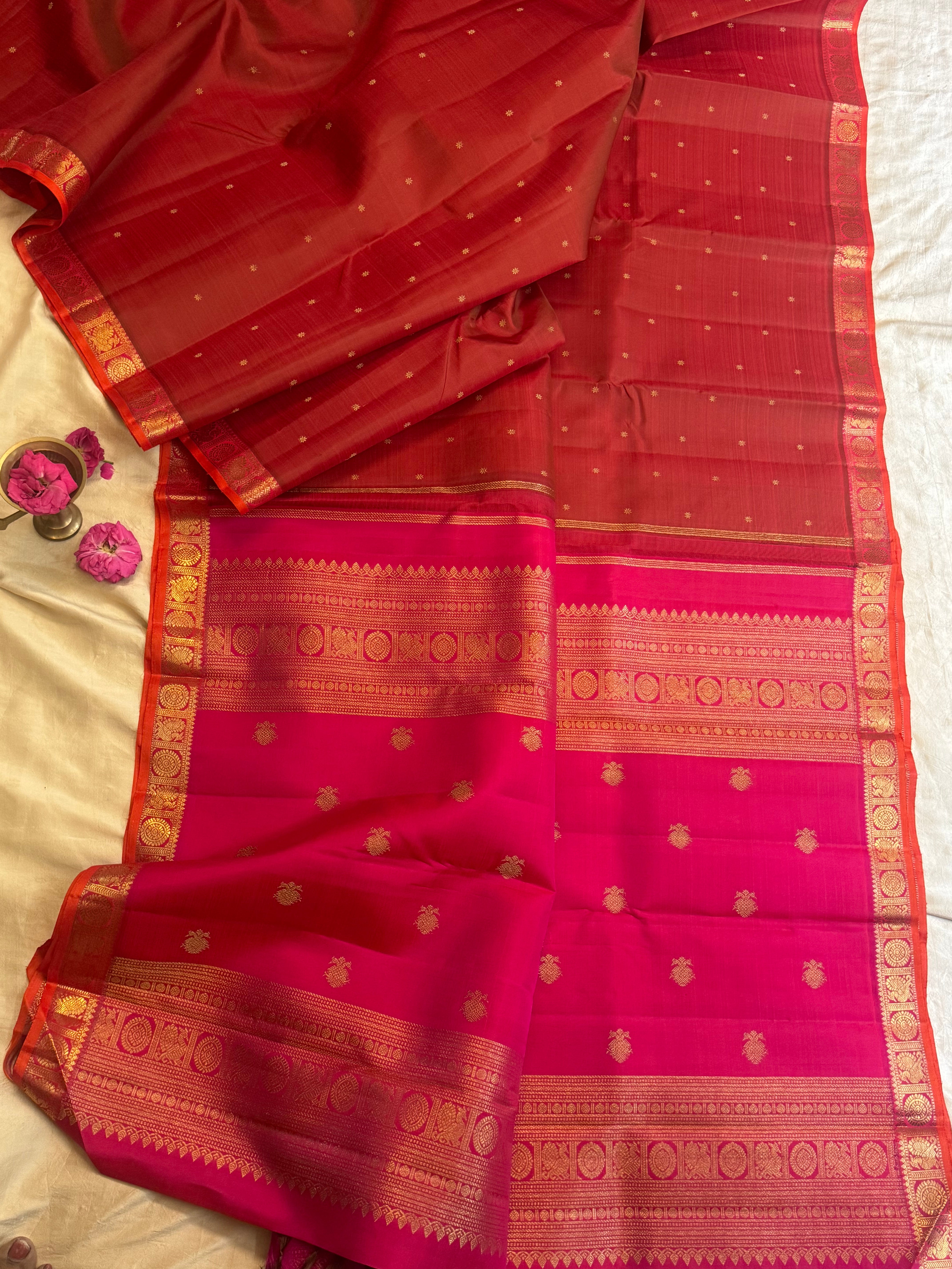 Manthulir pink border small border kanjipuram silk
