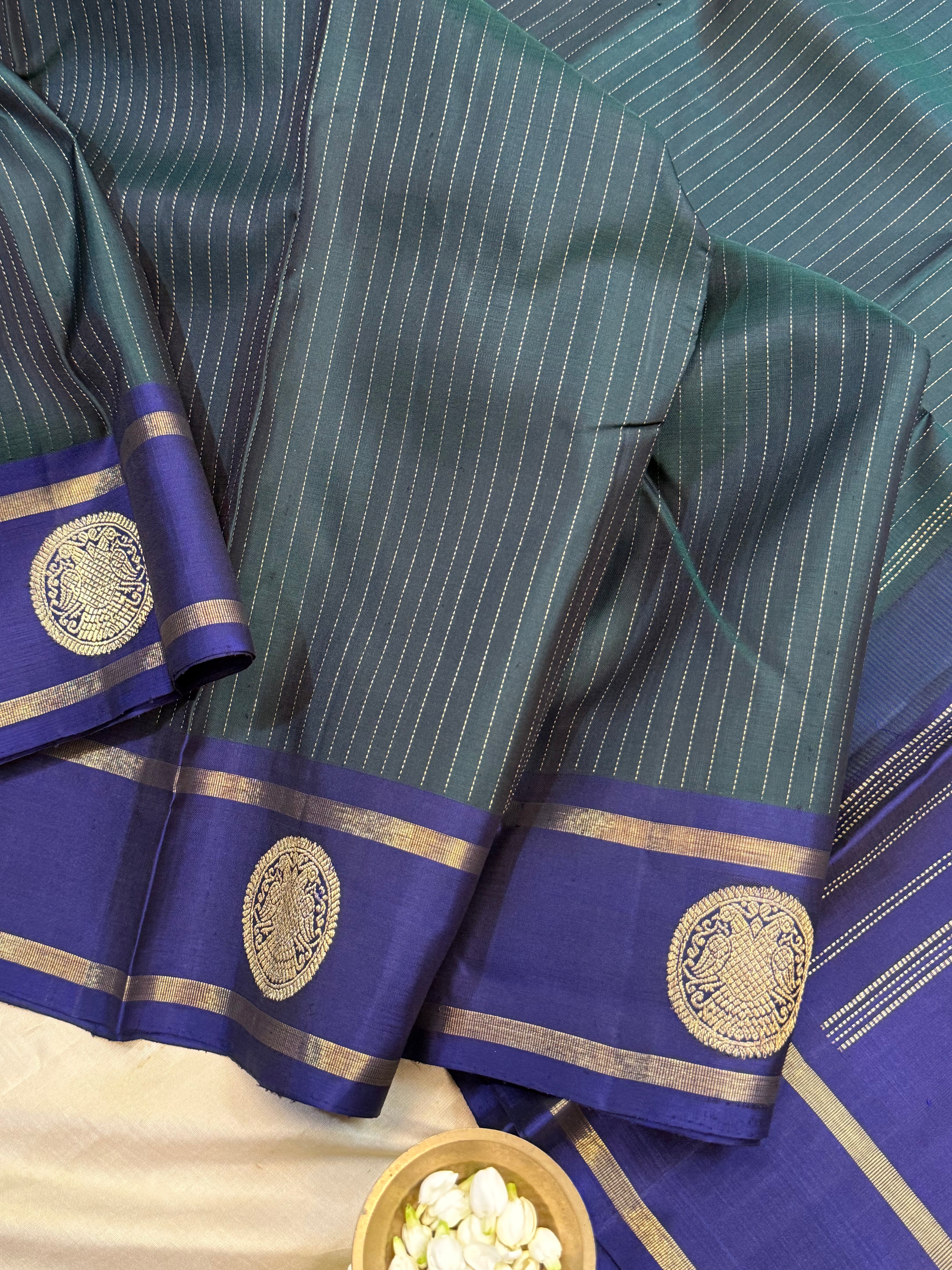 Dark green and violet oosi stripes border butta / Kanjipuram silk