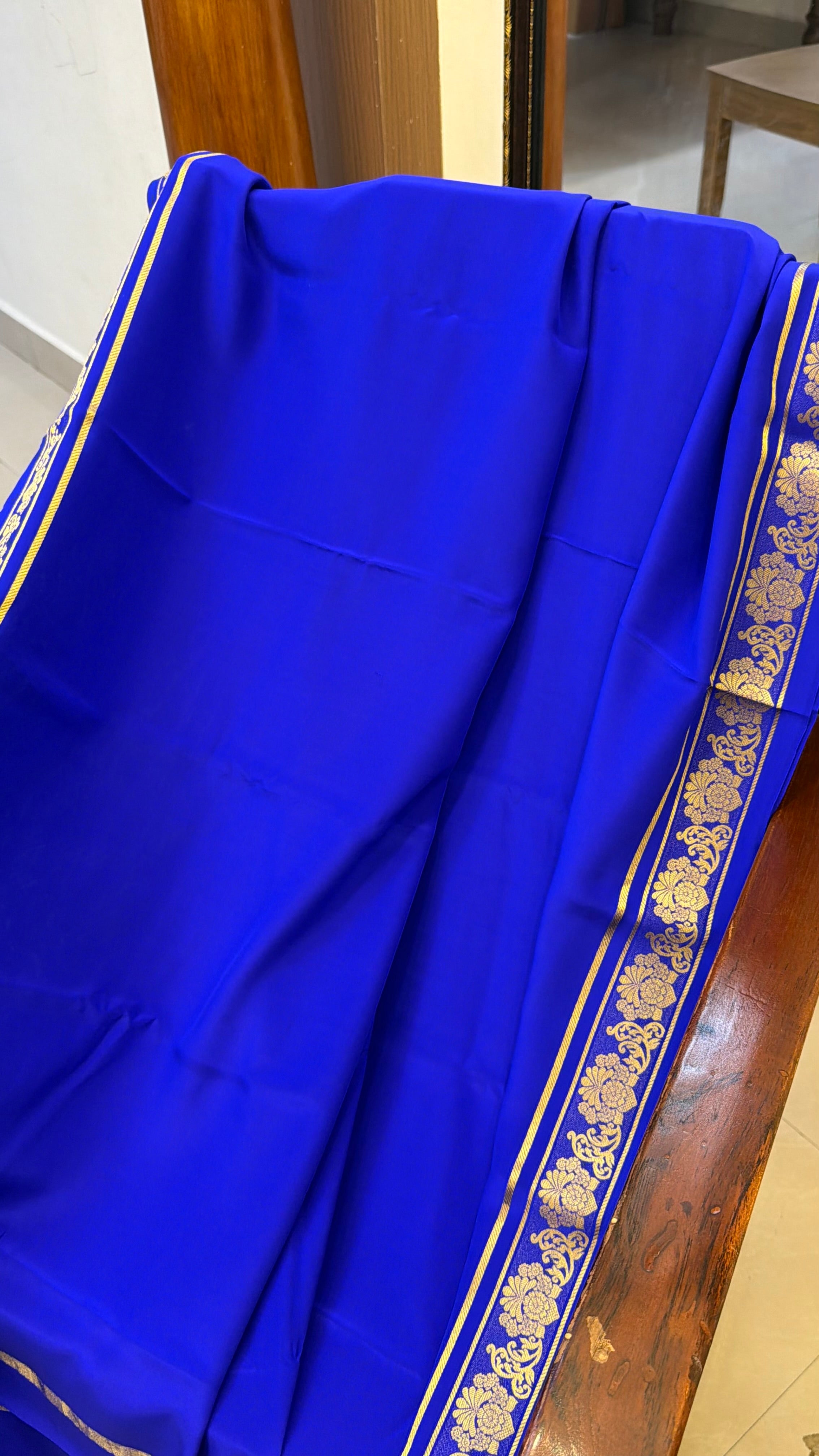 Floral border ms blue Pure crepe silk saree