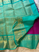 Magenta And Sea Green Korvai Kanjivaram Silk Saree