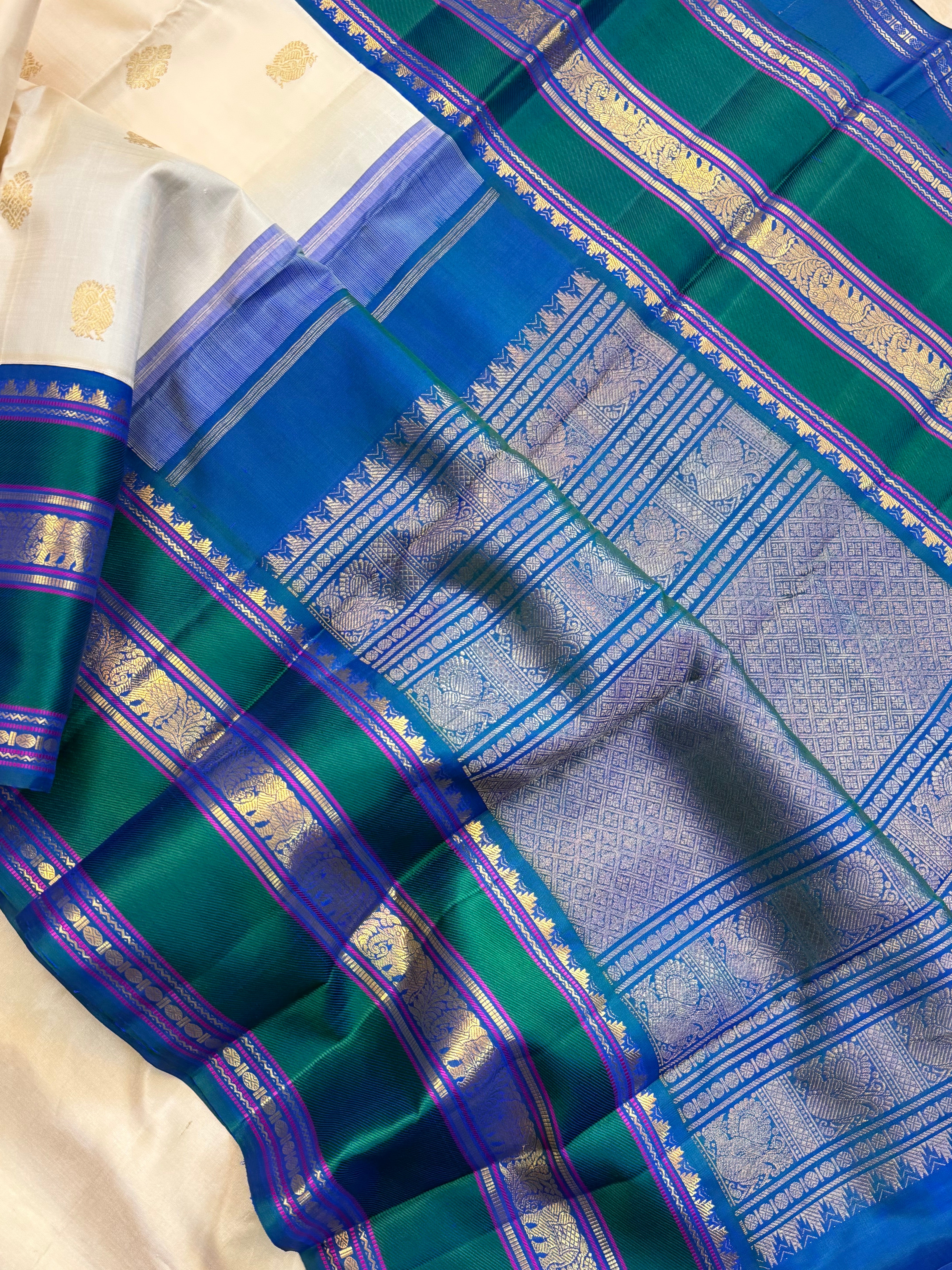 Onam collection: off white triple pet Korvai / pure zari Kanjipuram silk