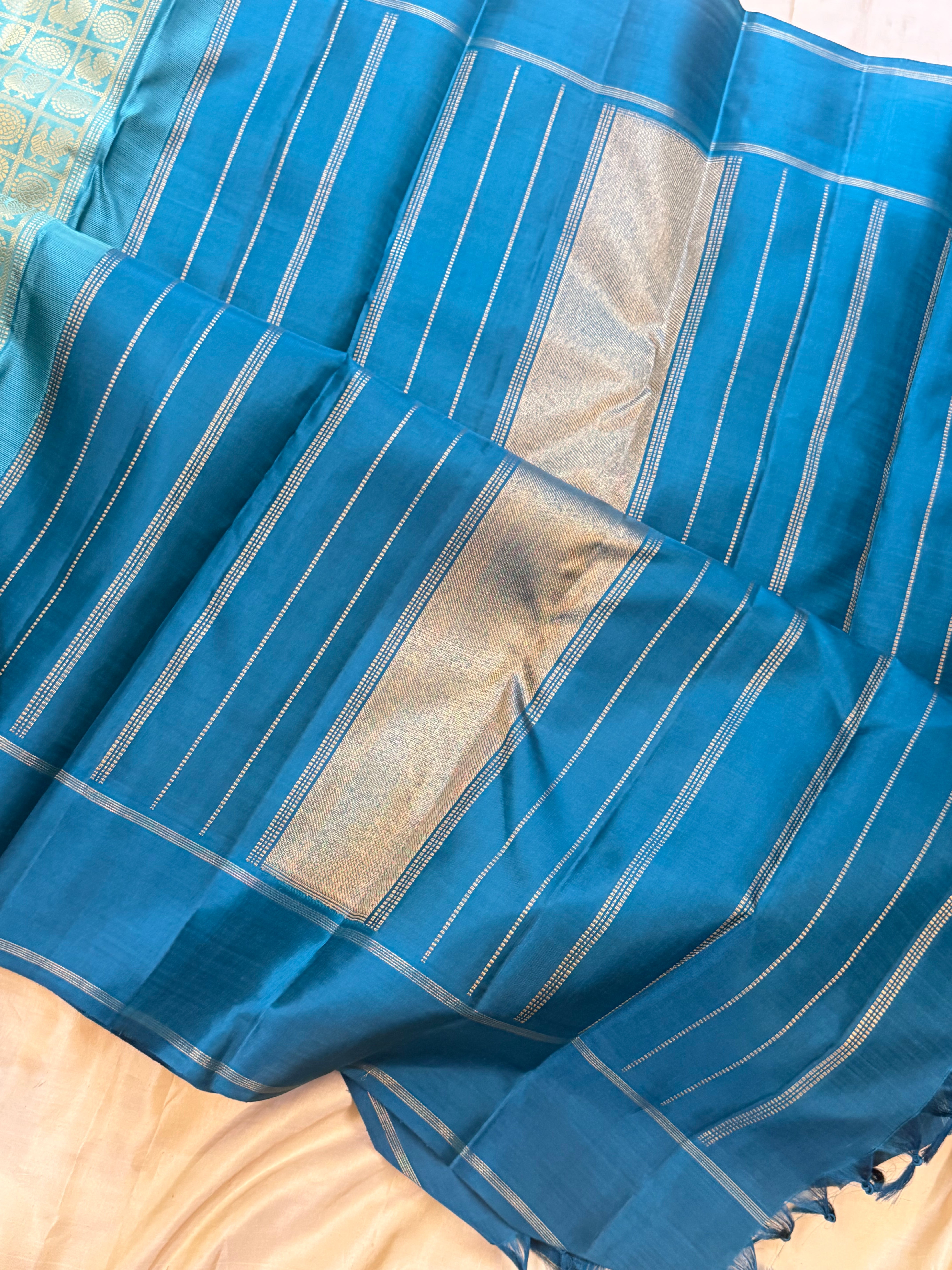 Teal blue 1000 Butta pure Zari Kanjipuram silk