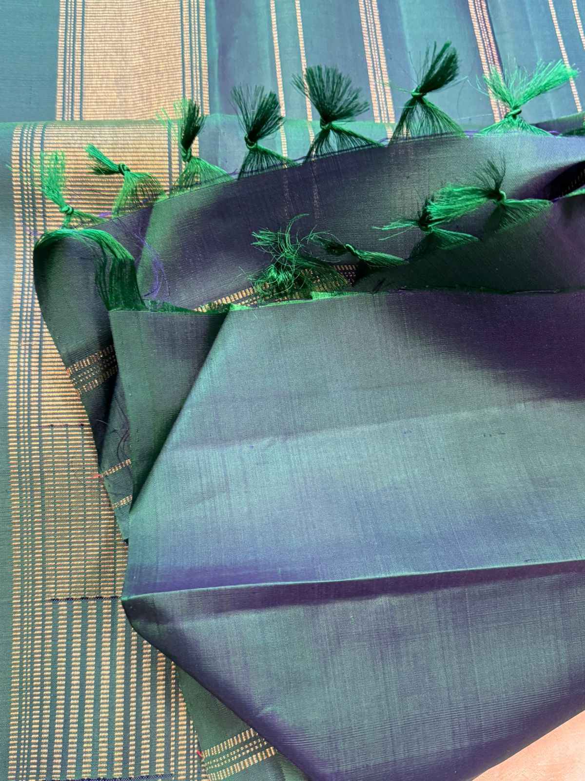 Mayilkazhuthu green long border / kanjipuram silk