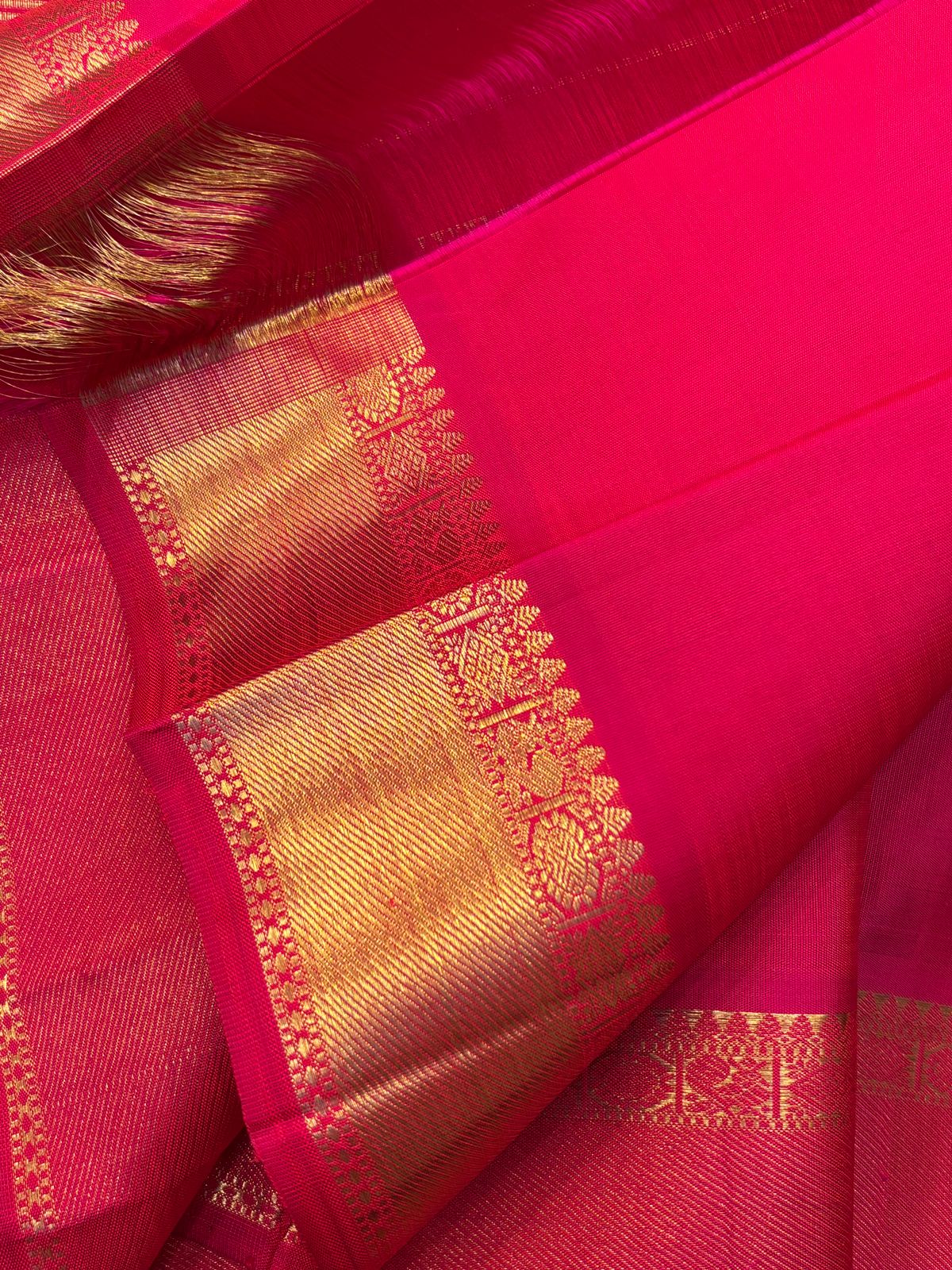 Pinkish red kolam butta and unique Iruthalaipakshi palla / kanjipuram silk
