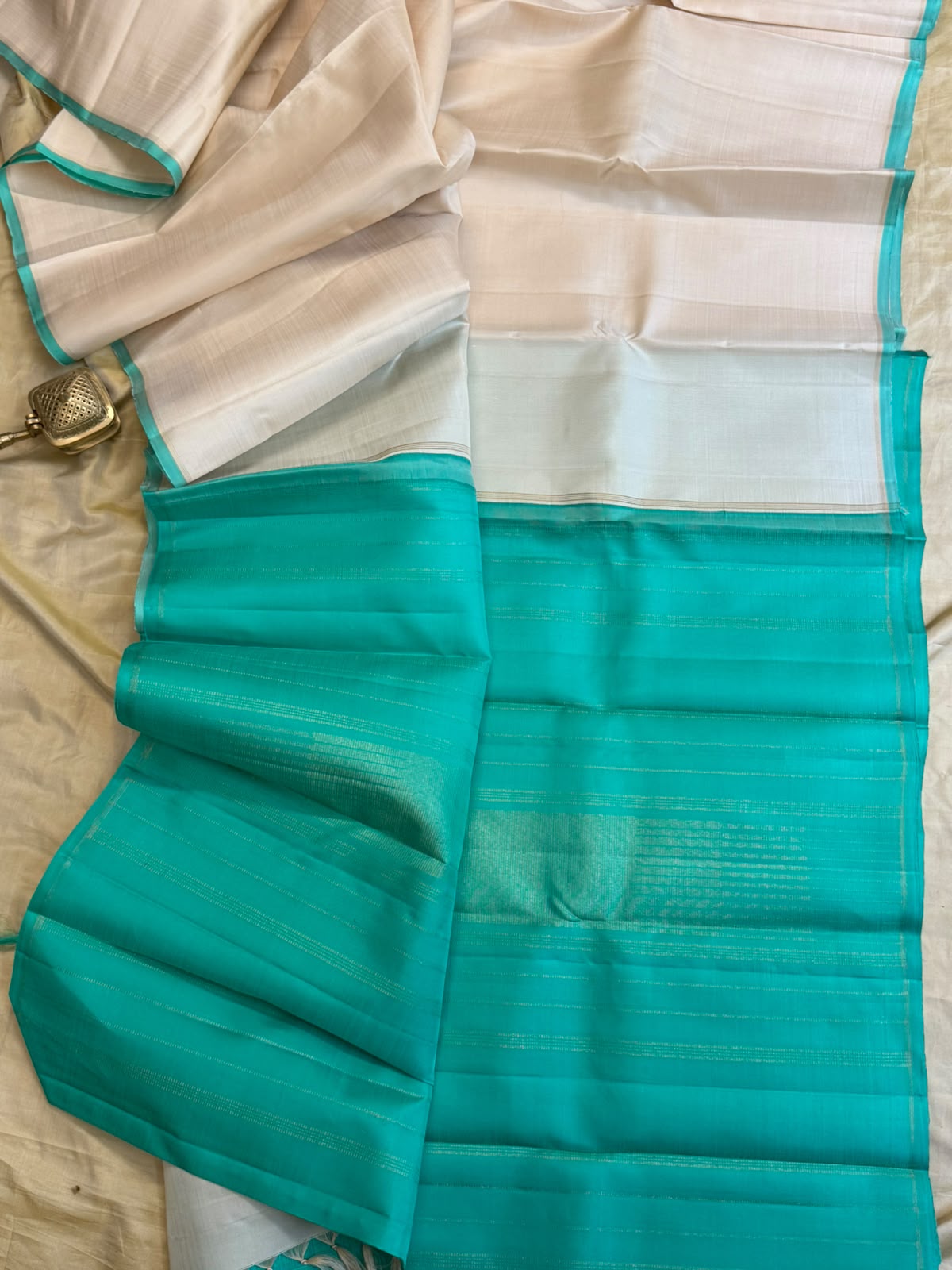Offwhite and turquoise green borderless/ Kanjipuram silk CL9776