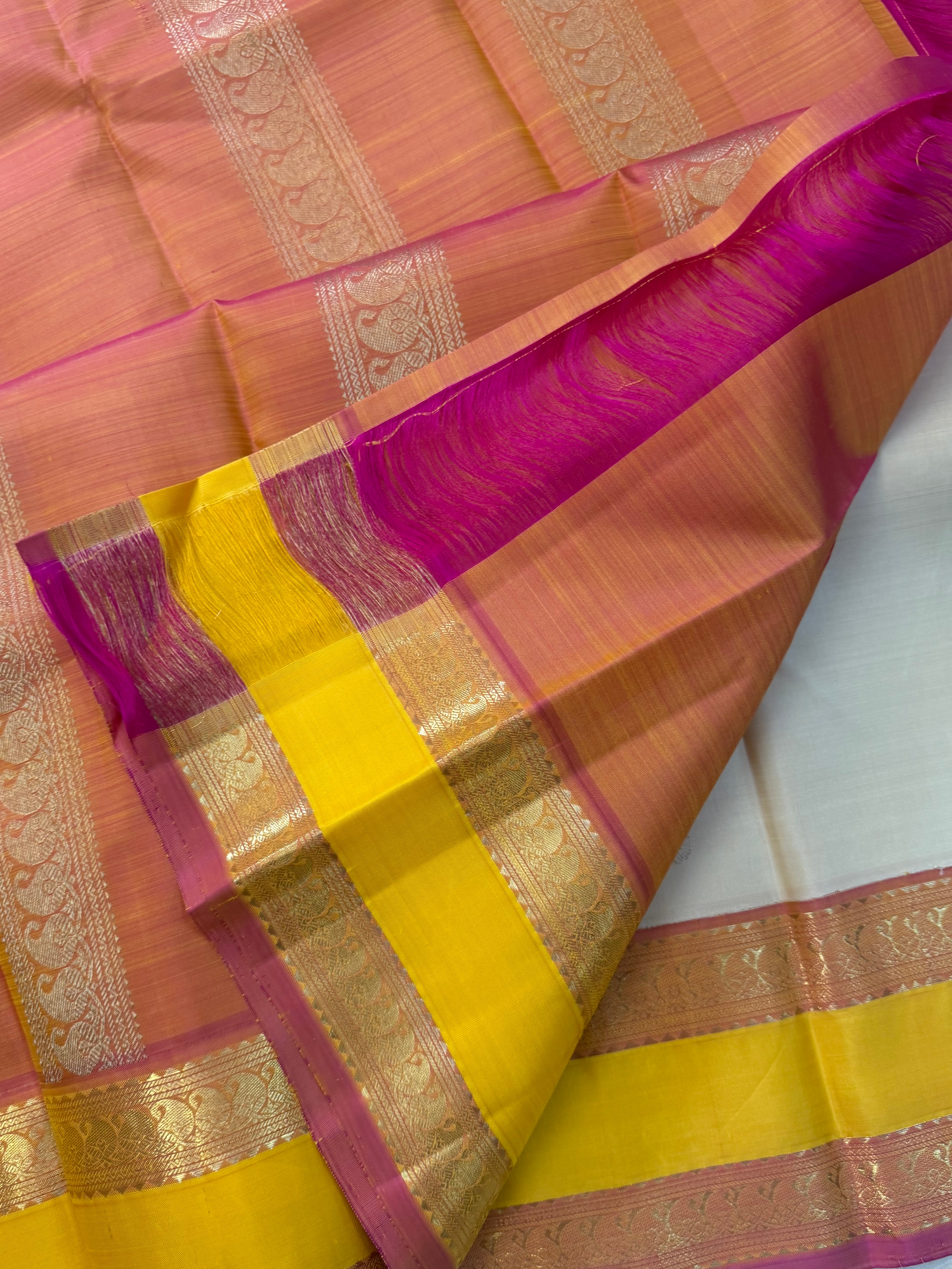 Onam collection:  cream retta pet Korvai / pure zari Kanjipuram silk