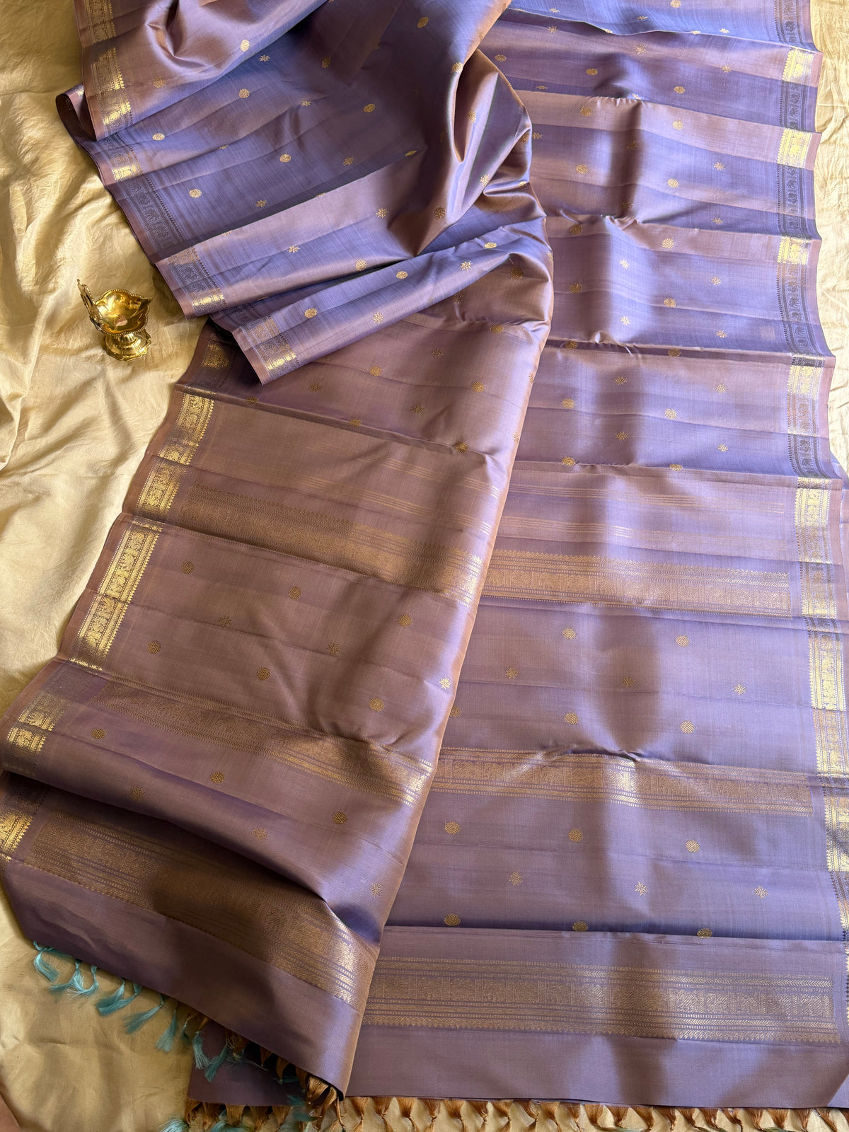 Pastel mauve  color pure Zari pencil border Kanjipuram