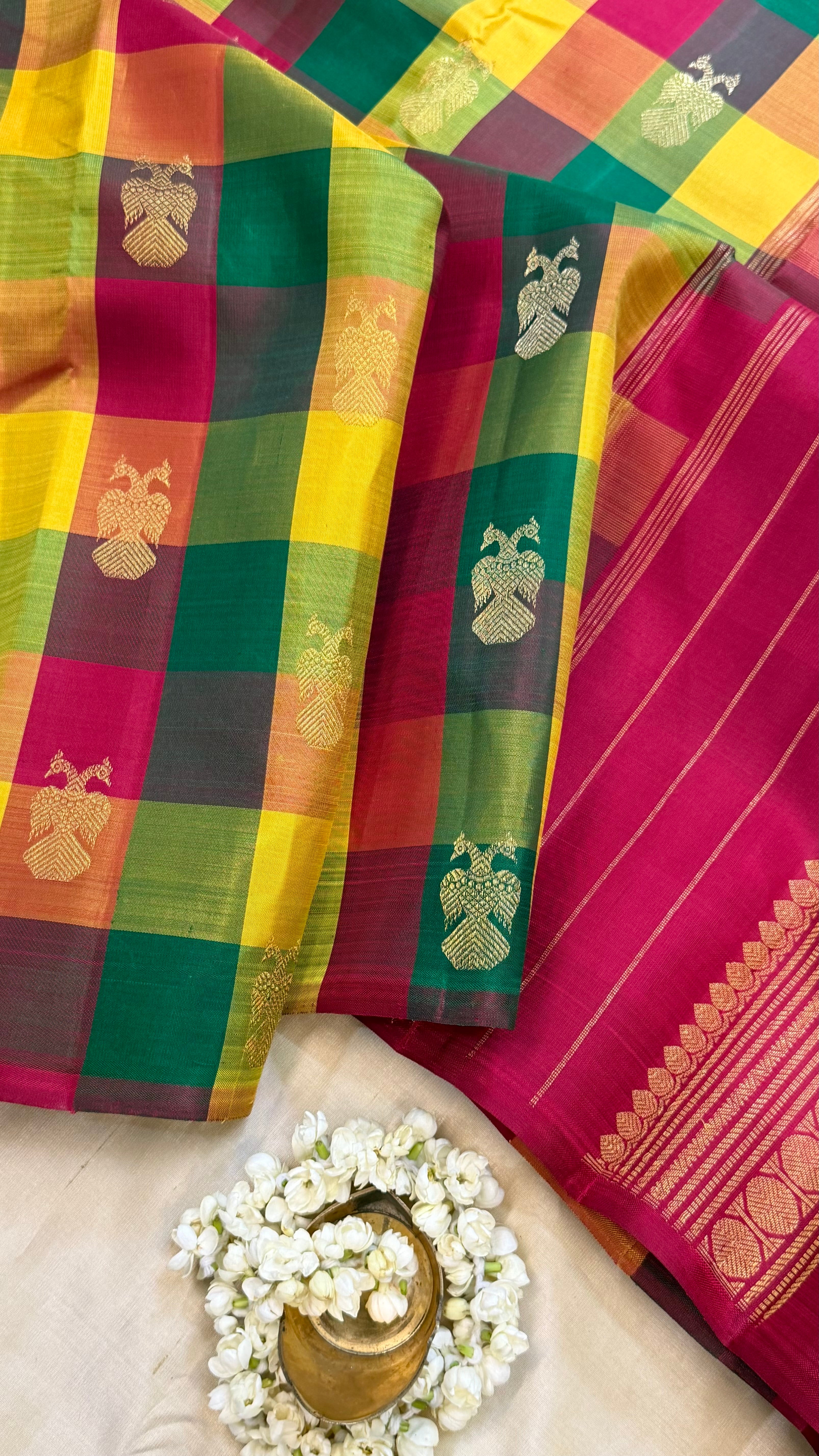 Paalum pazhamum checks Iruthalaipakshi butta/ kanjipuram silk