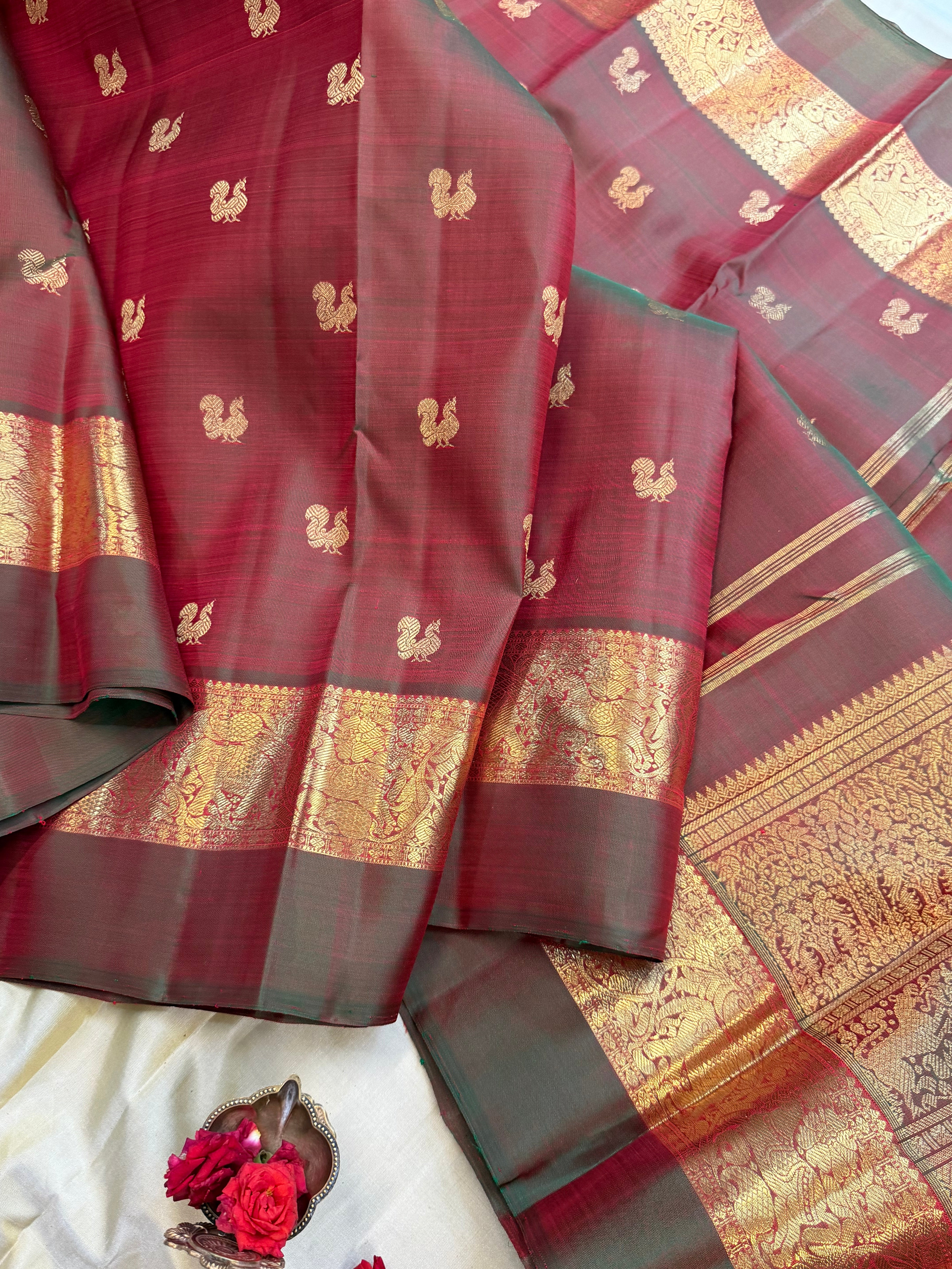 Mann : kaal erangina border earthy hues in pure Zari Kanjipuram silk