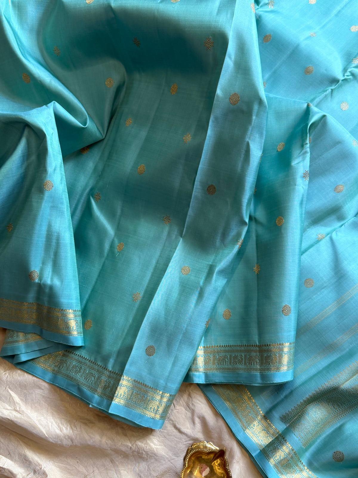 Pastel powder blue  color pure Zari pencil border Kanjipuram