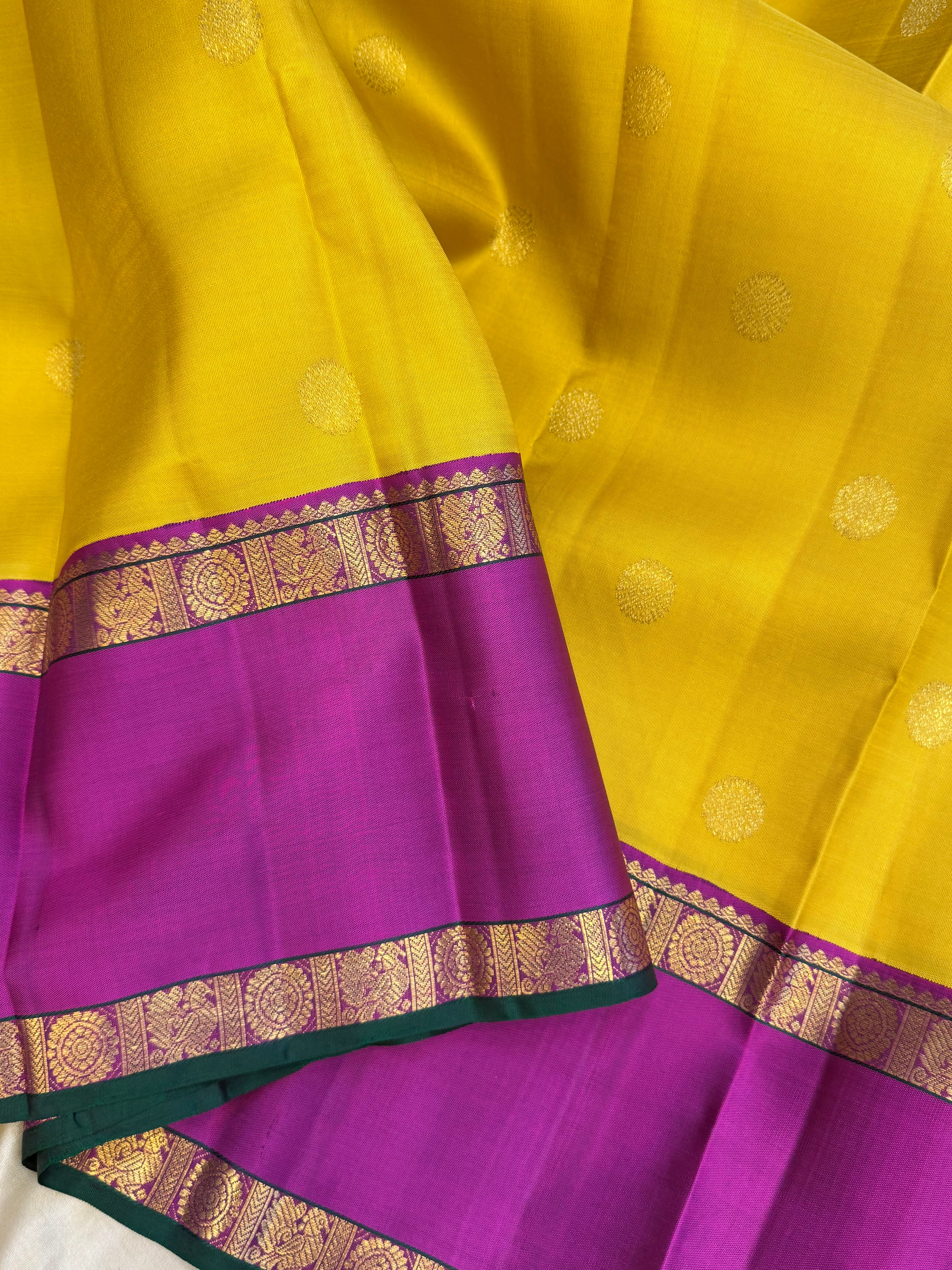 Sampanga yellow and magenta rettapet border / kanjipuram silk
