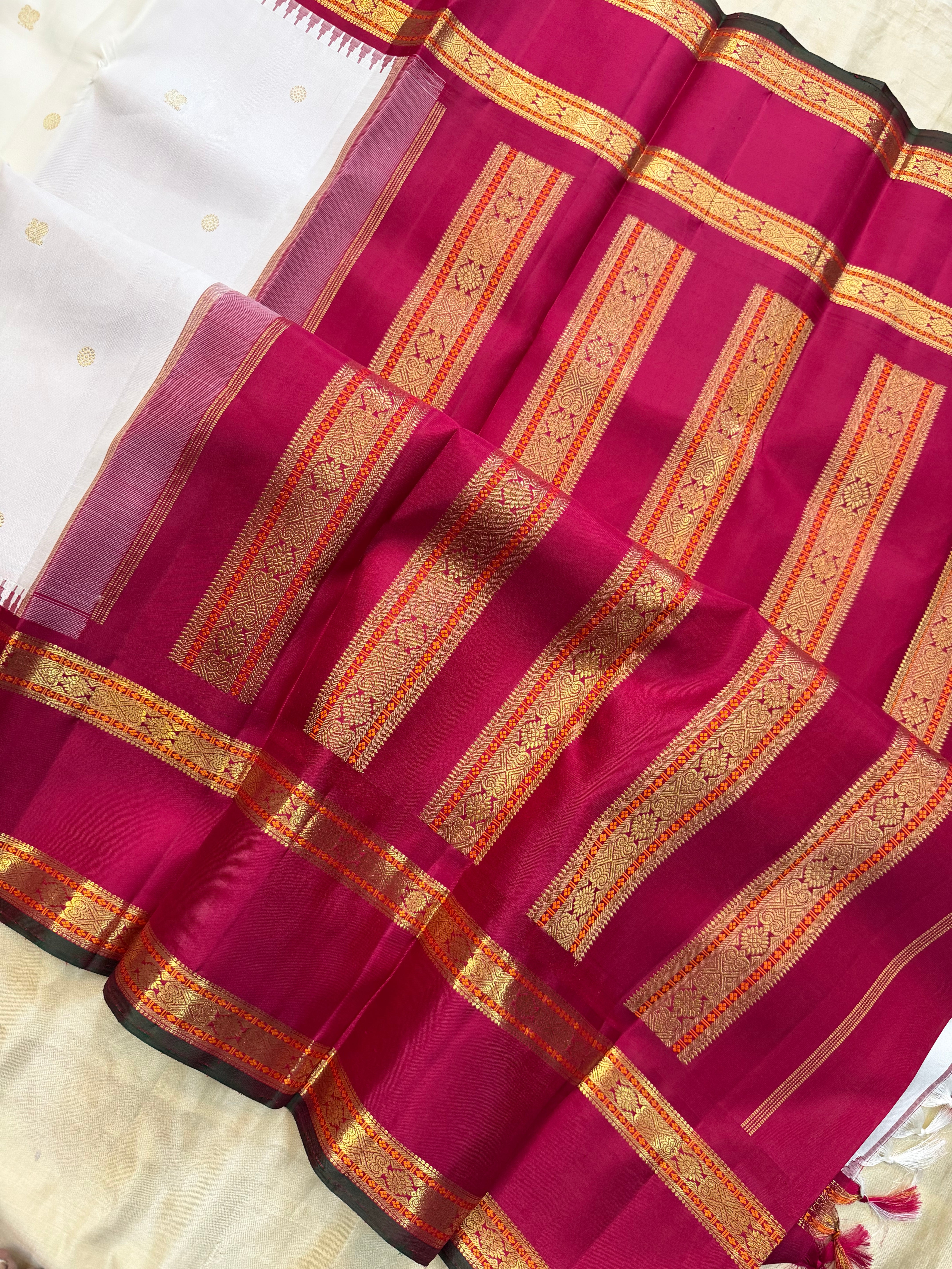 Onam collection:  off white red retta pet Korvai / pure zari Kanjipuram silk