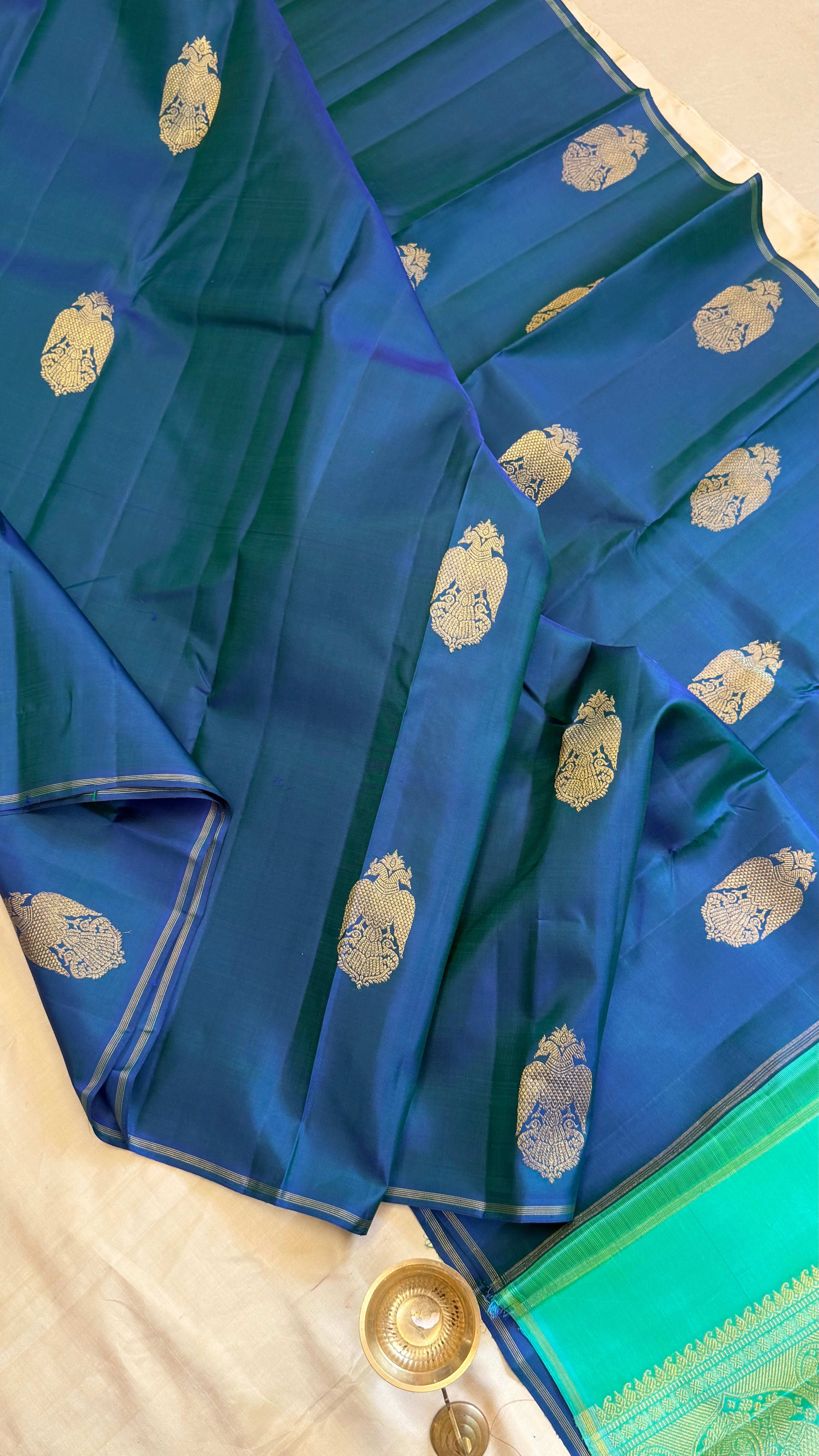 Rama blue  Iruthalaipakshi butta borderless/ Kanjipuram Silk