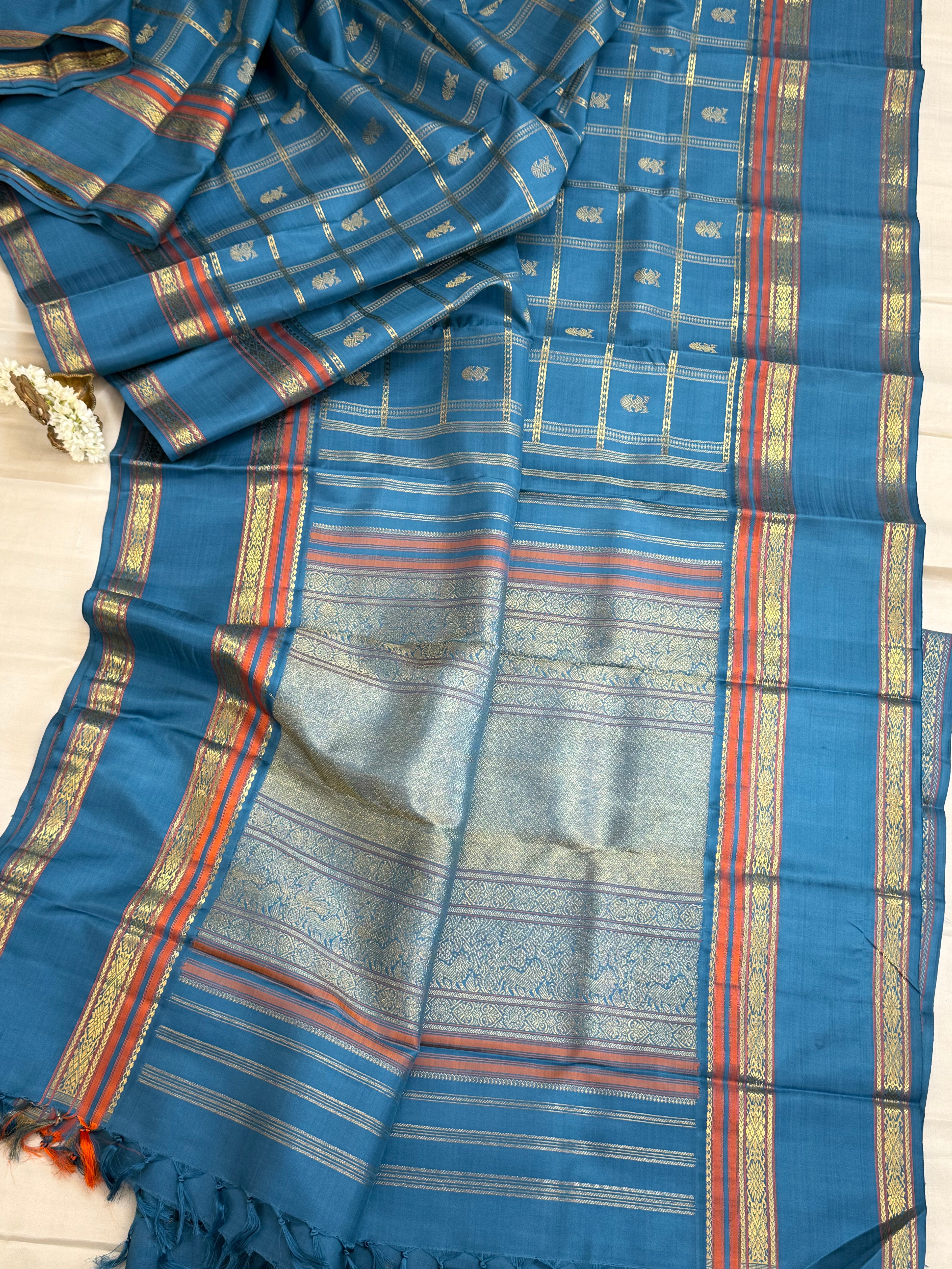 Master weaver Powder blue Kattam Butta Kanjipuram silk