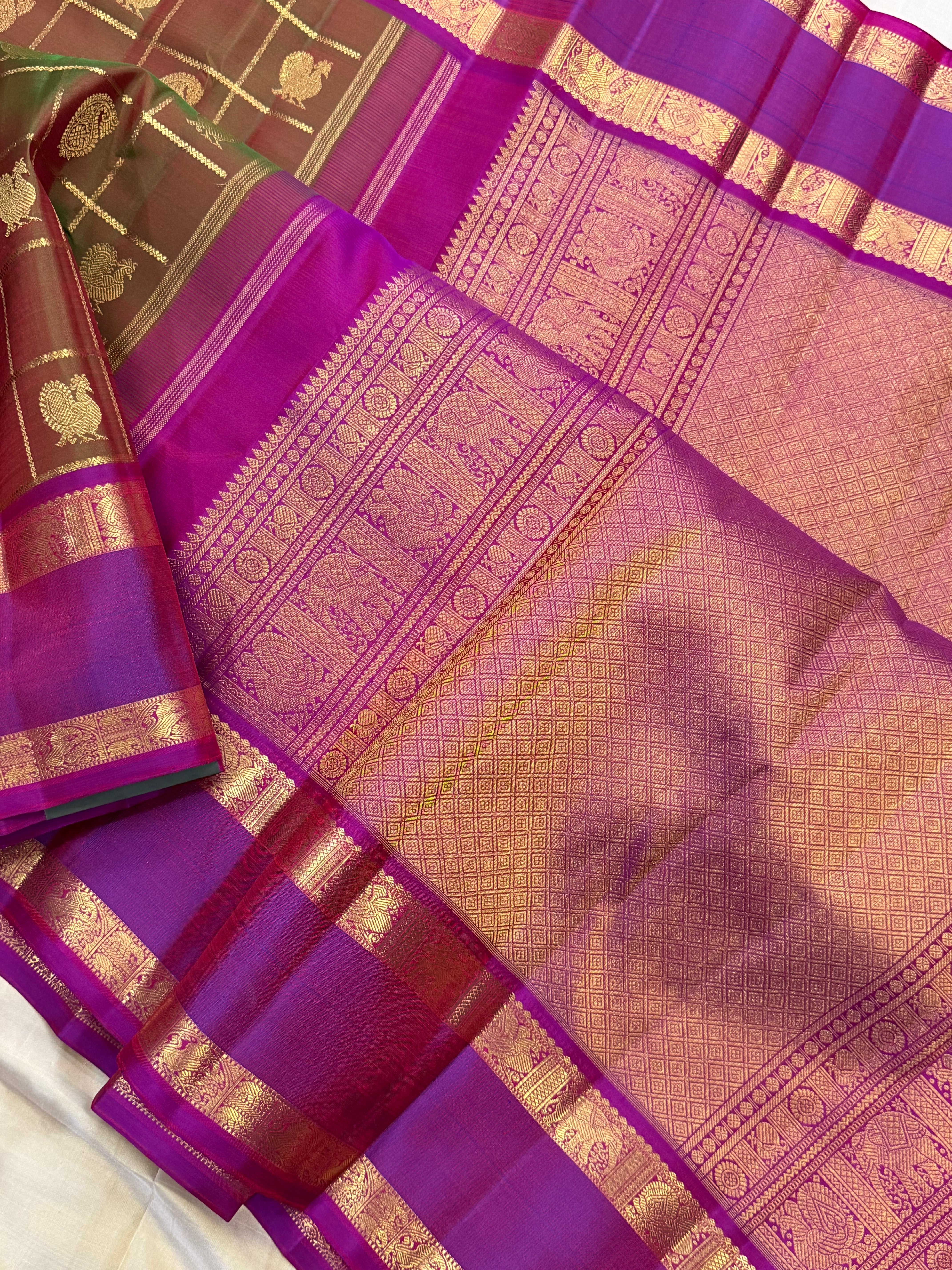 Mann : manthulir  Kattam earthy hues in pure Zari Kanjipuram silk