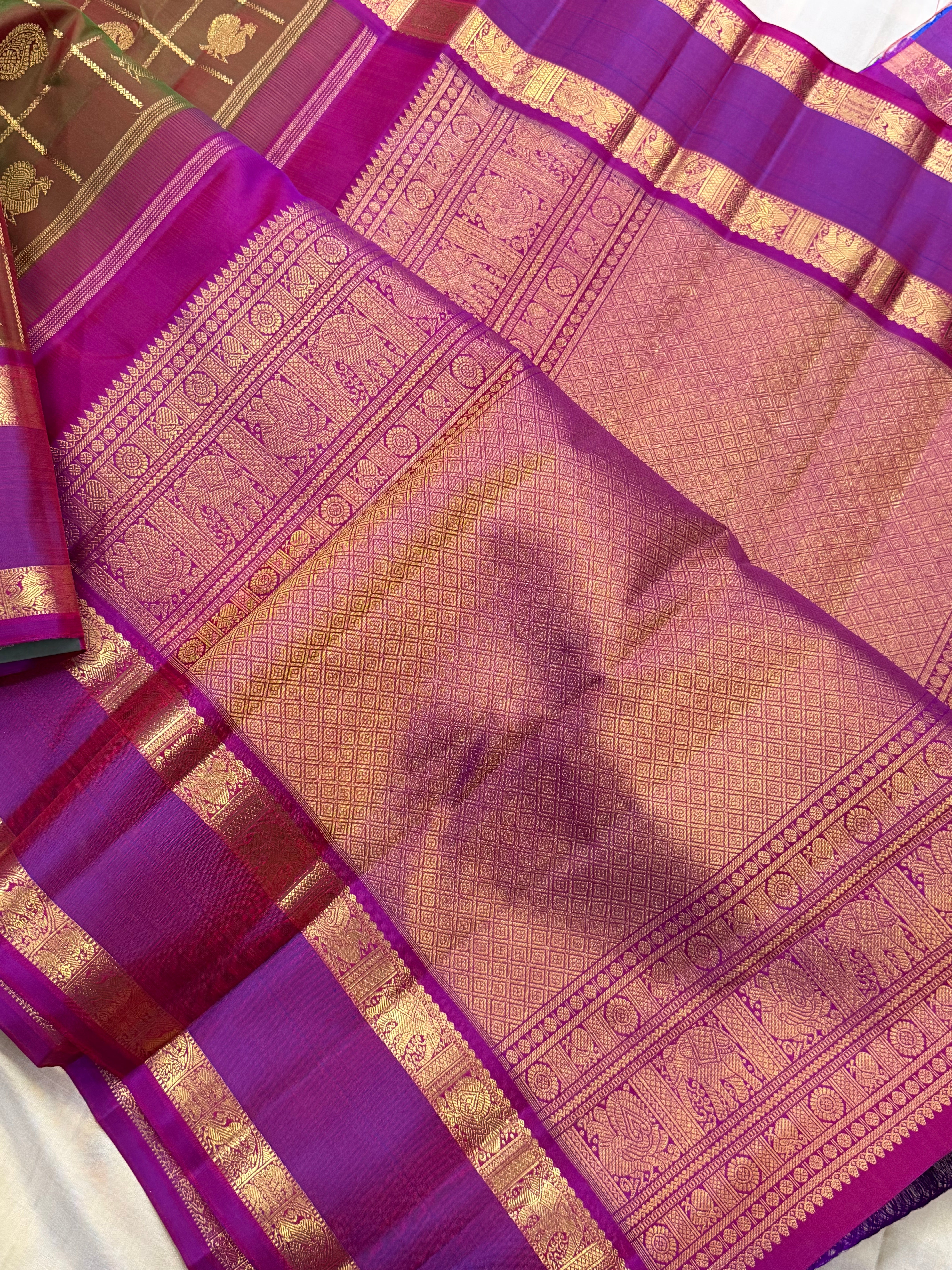 Mann : manthulir  Kattam earthy hues in pure Zari Kanjipuram silk
