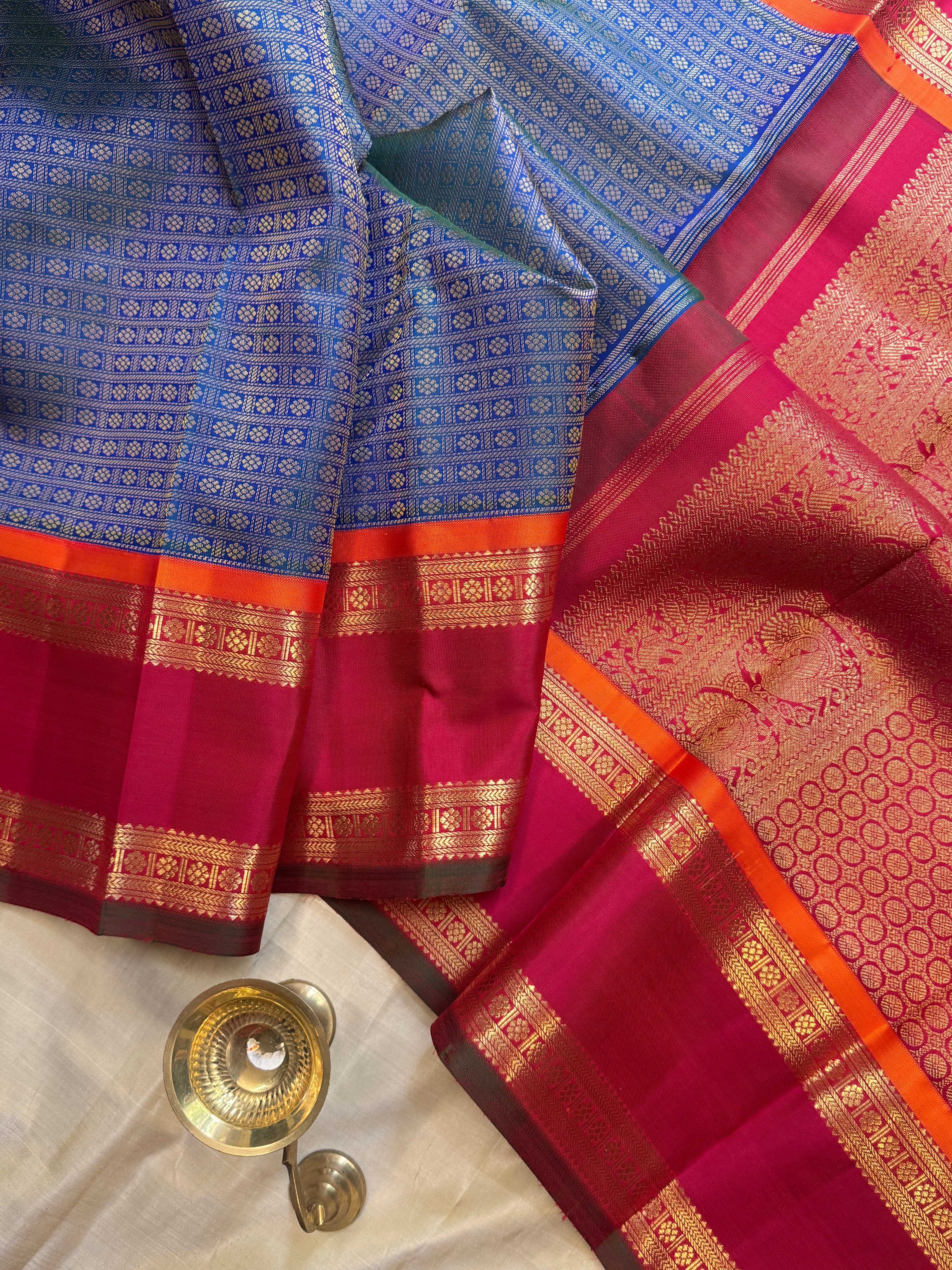 Mayilkazhuthu Laksham Butta korvai : kanjipuram silk