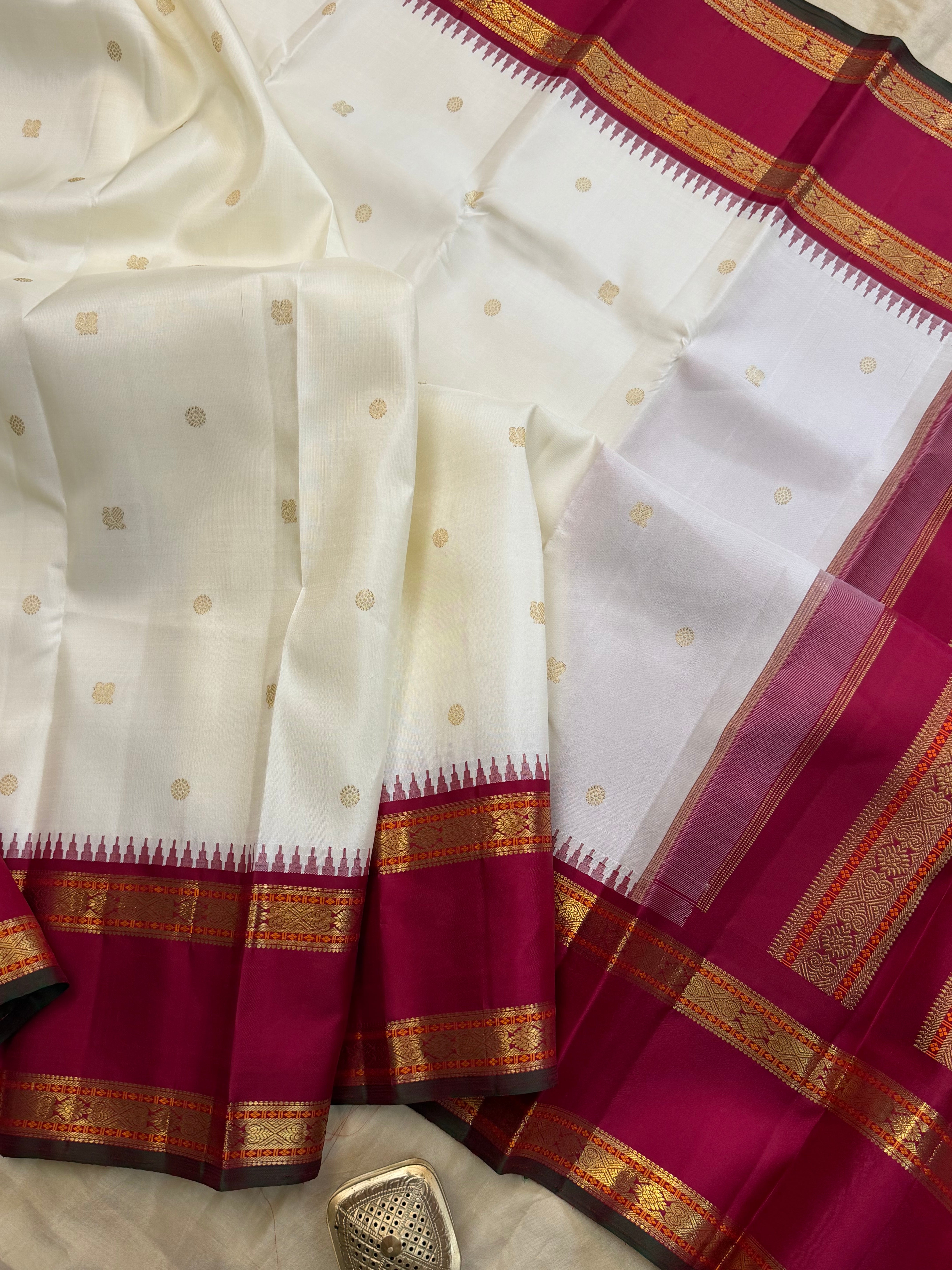 Onam collection:  off white red retta pet Korvai / pure zari Kanjipuram silk