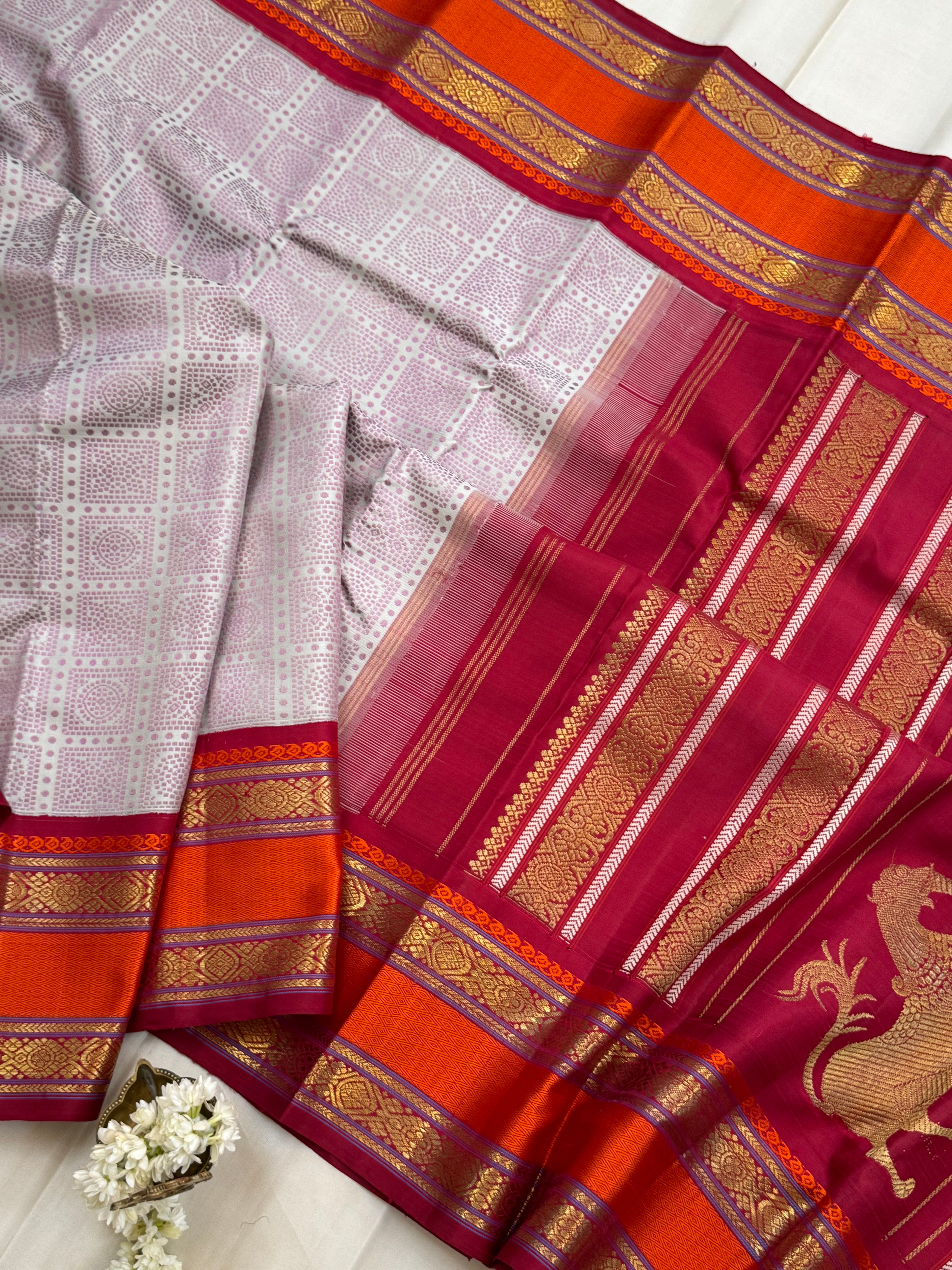 Bandhini Butta retta pet Korvai master weaver  Kanjipuram silk
