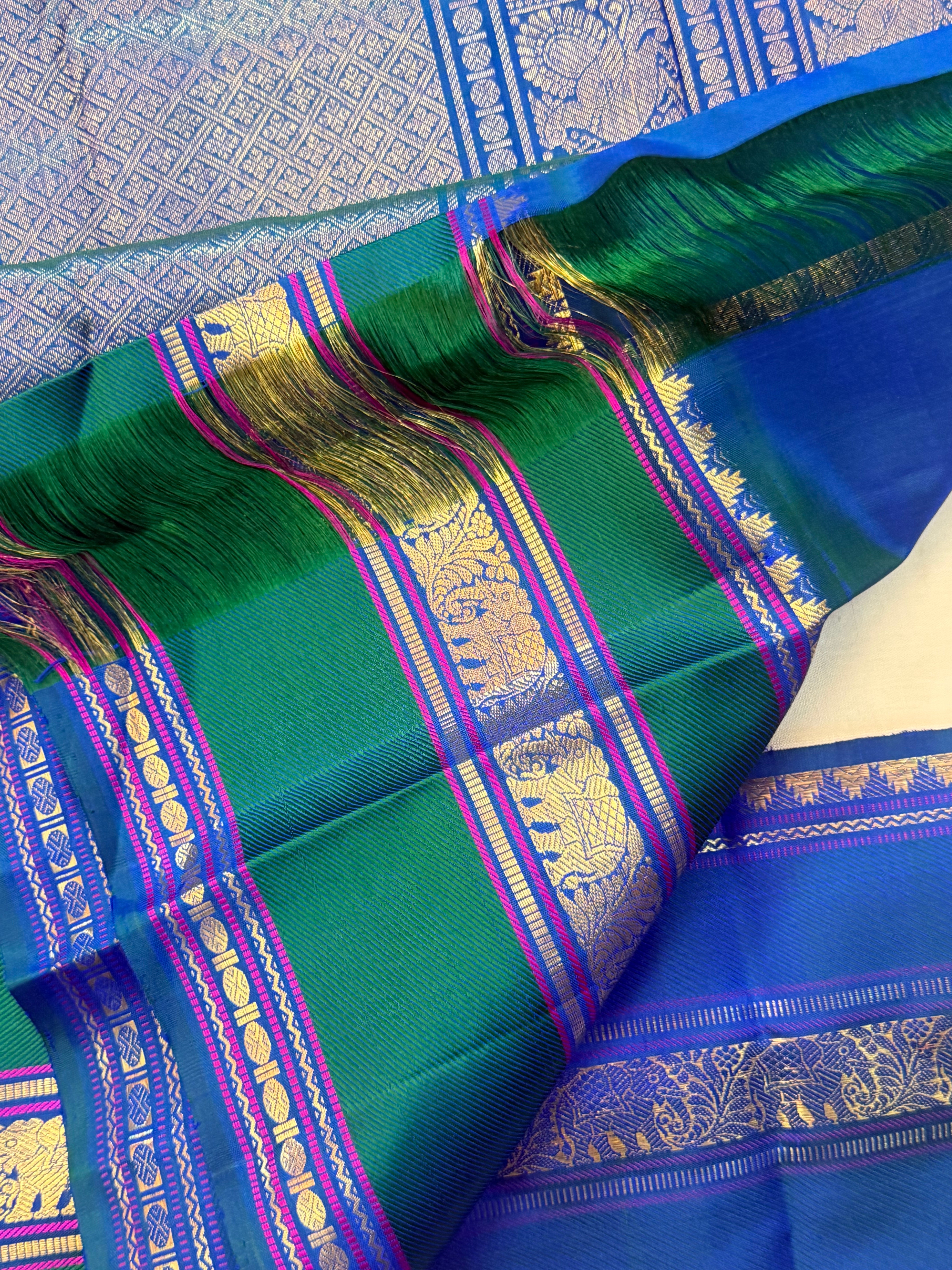 Onam collection:  off white triple pet Korvai / pure zari Kanjipuram silk
