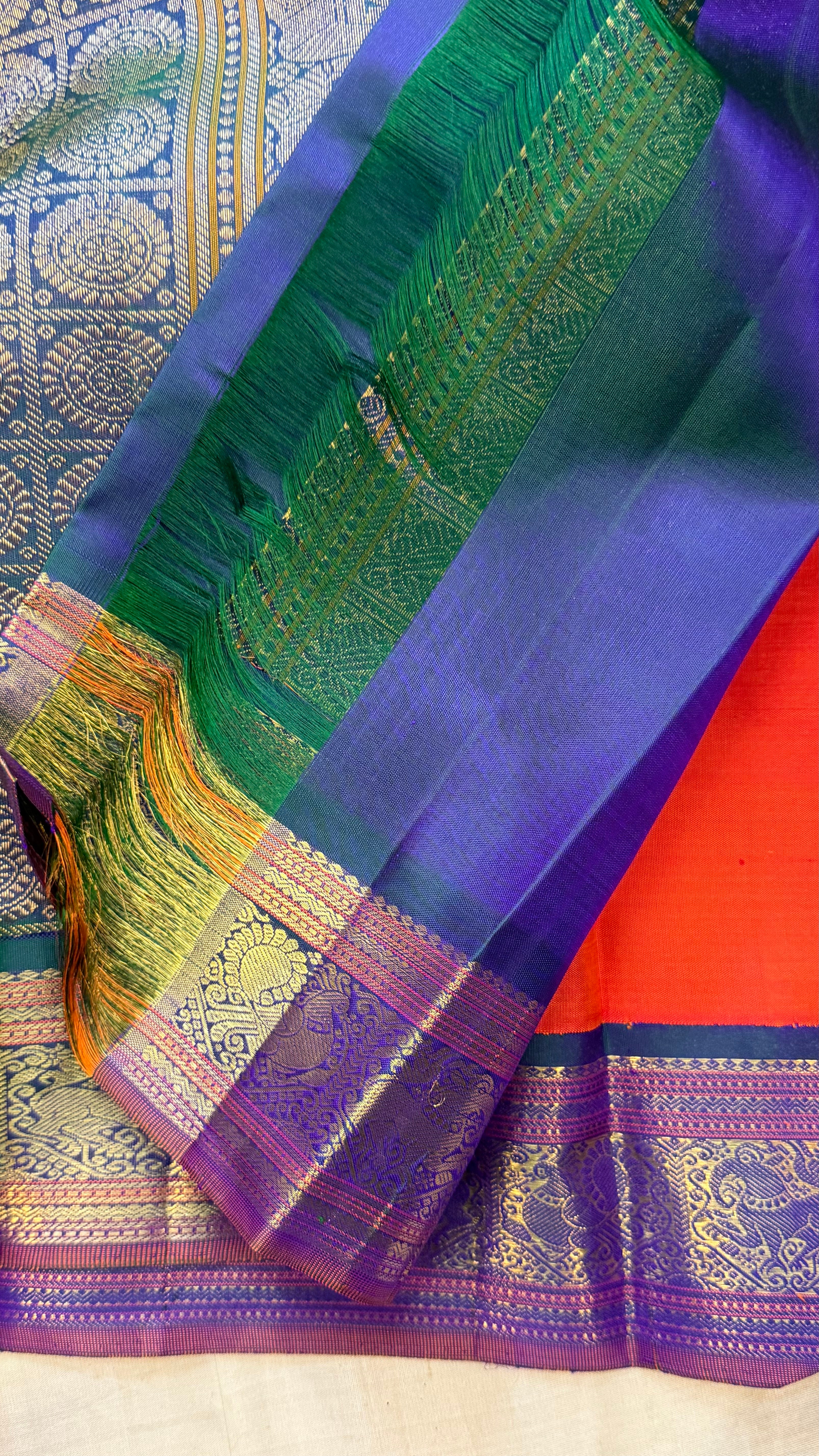 Orange and mayilkazhuthu Kai Korvai/Kanjipuram silk