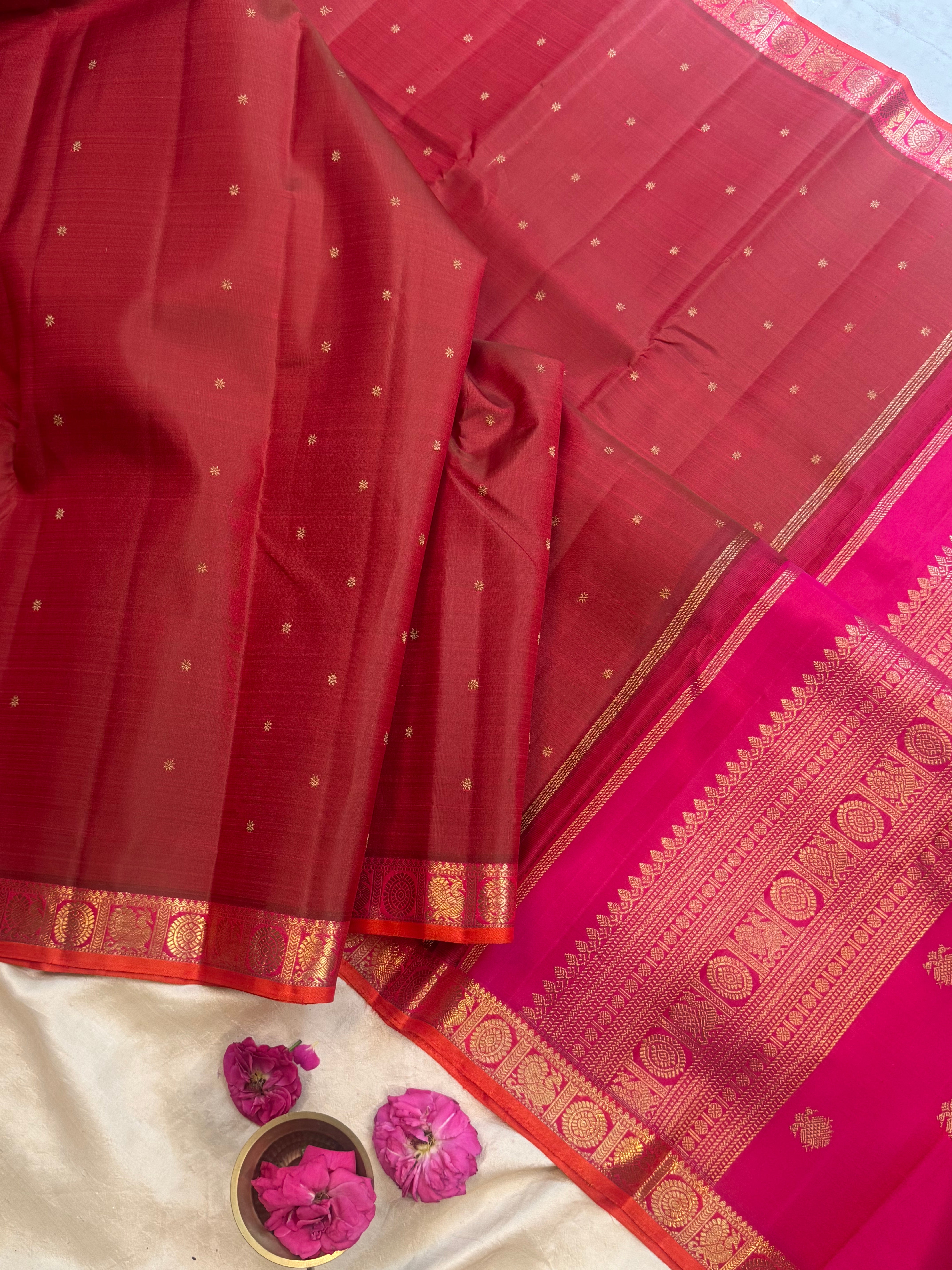 Manthulir pink border small border kanjipuram silk