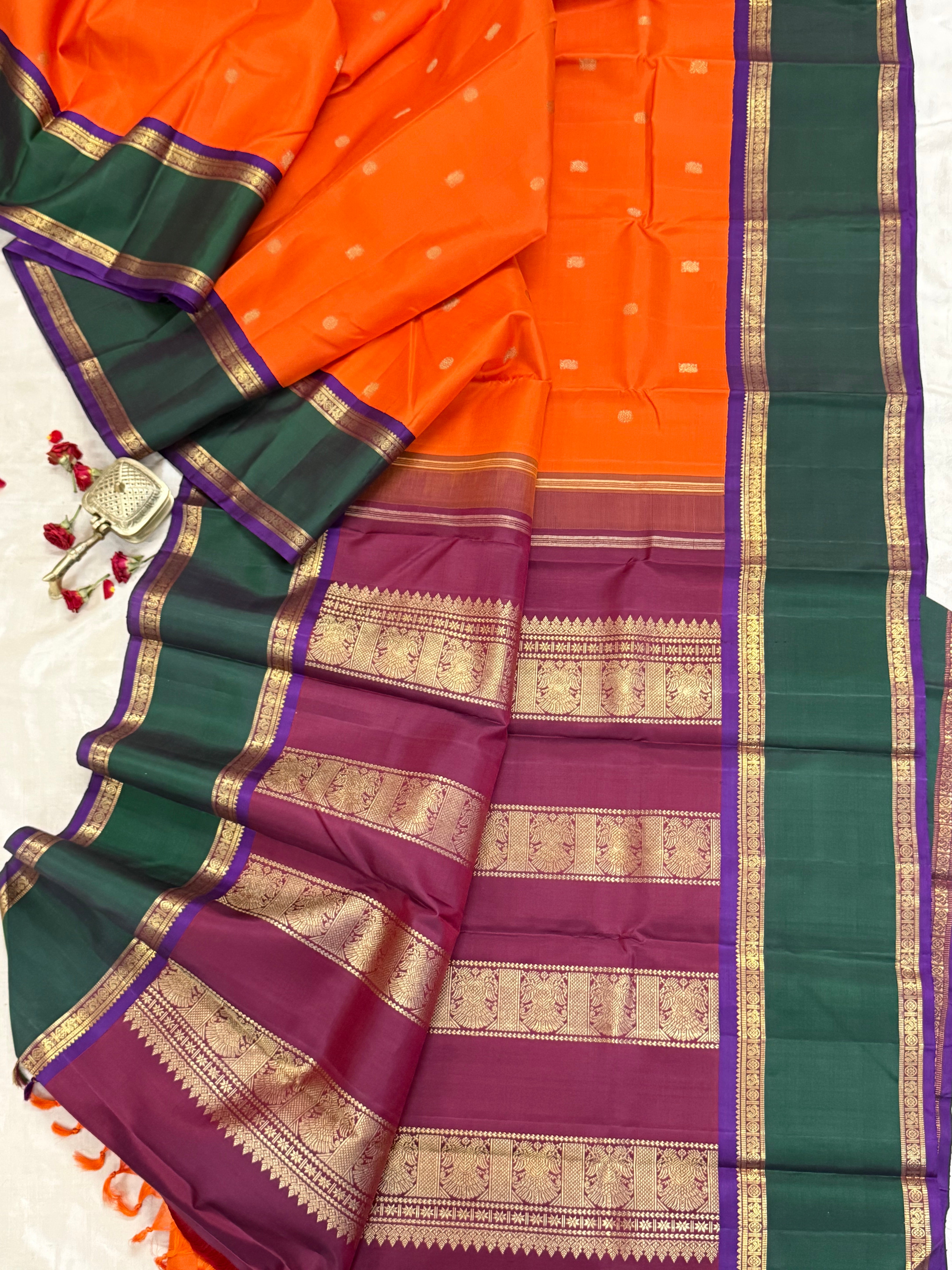 Orange and green border - Deep Araku pallu kai korvai/ Kanjipuram silk