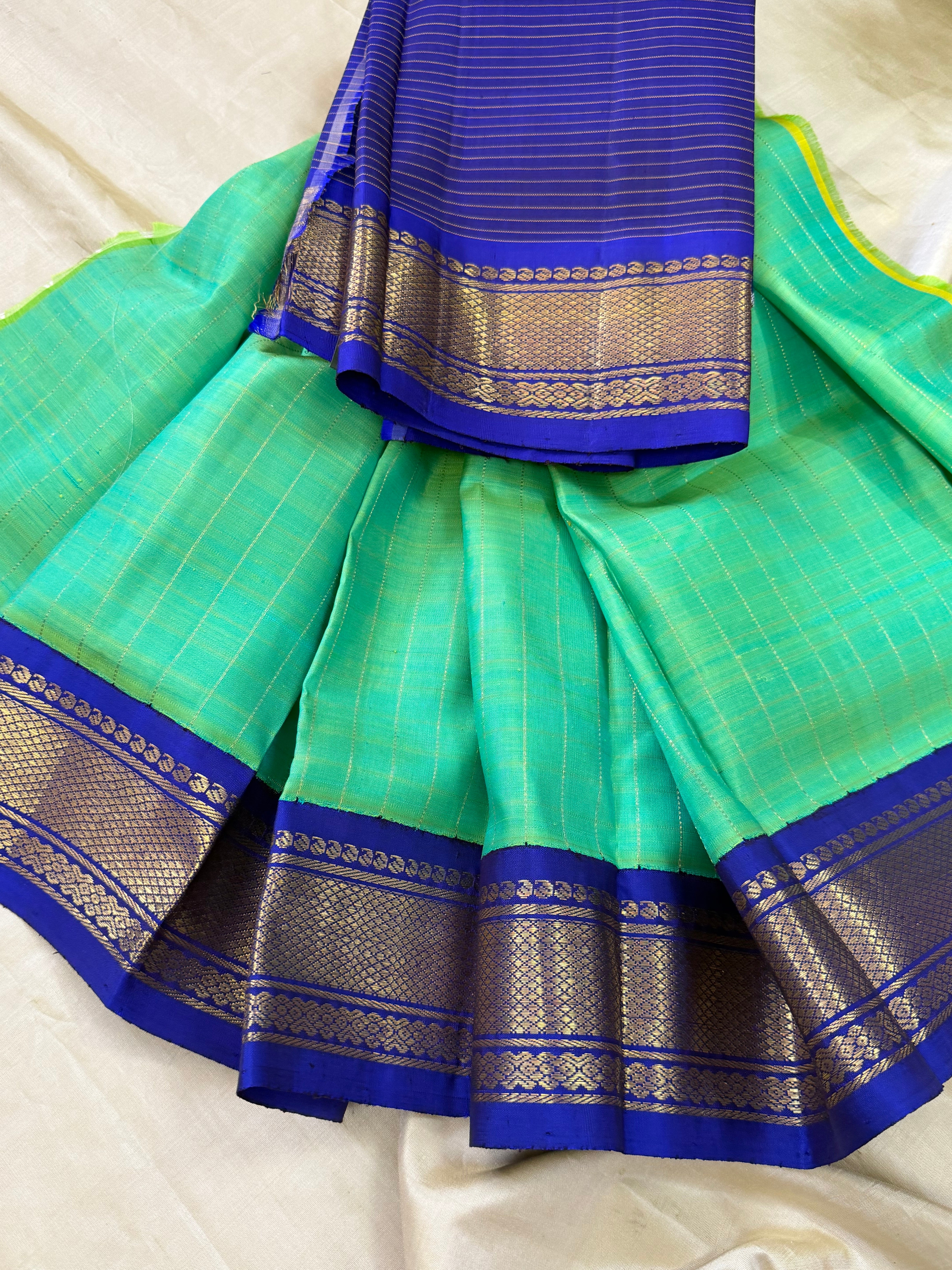 Sea green dense  pet  0 to 3 years  pure Zari Pattu Paavadai Korvai