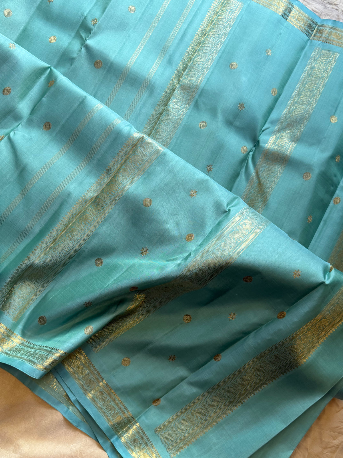Pastel powder blue  color pure Zari pencil border Kanjipuram