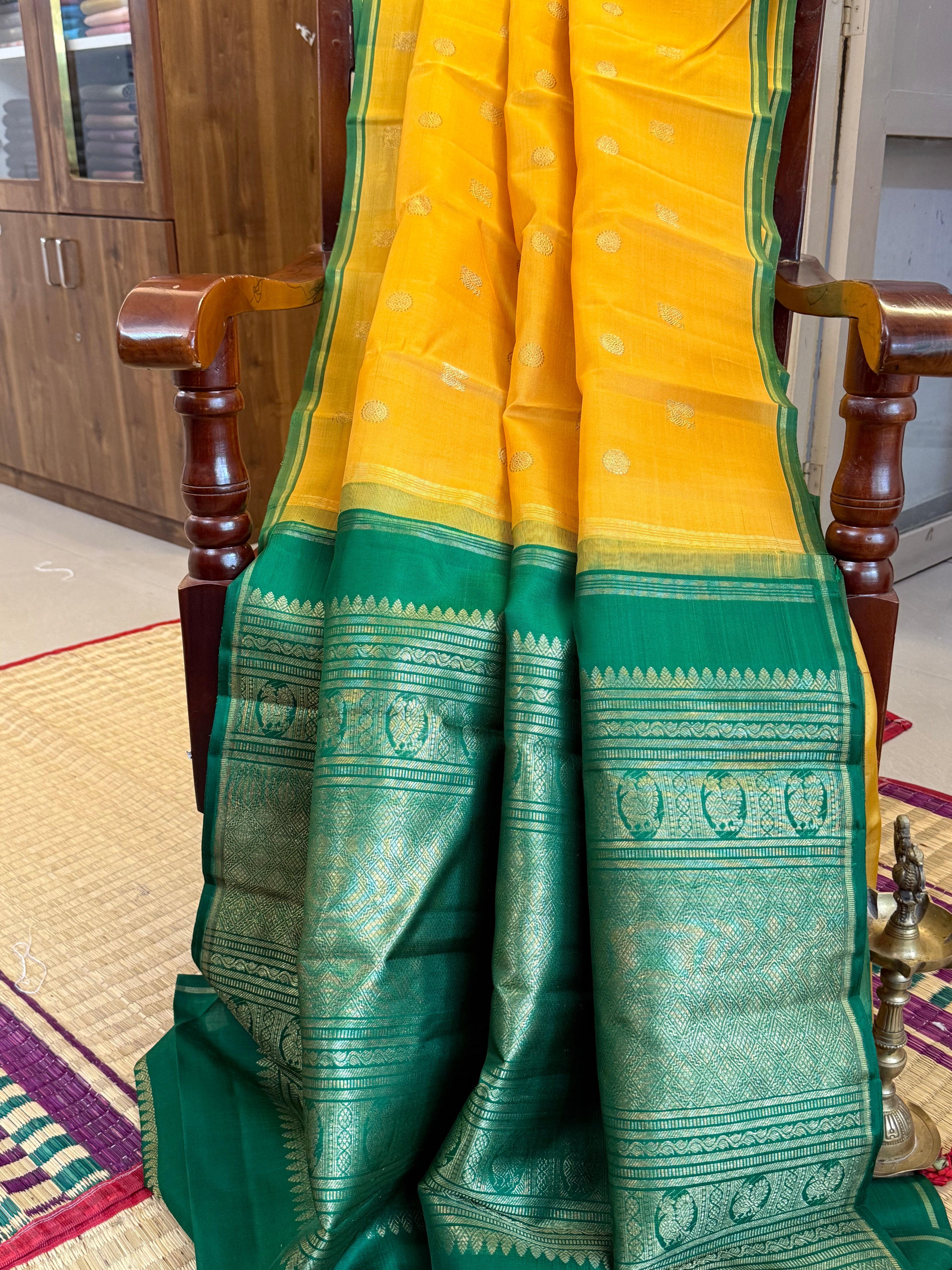 Mustard yellow with green Organza border less saree