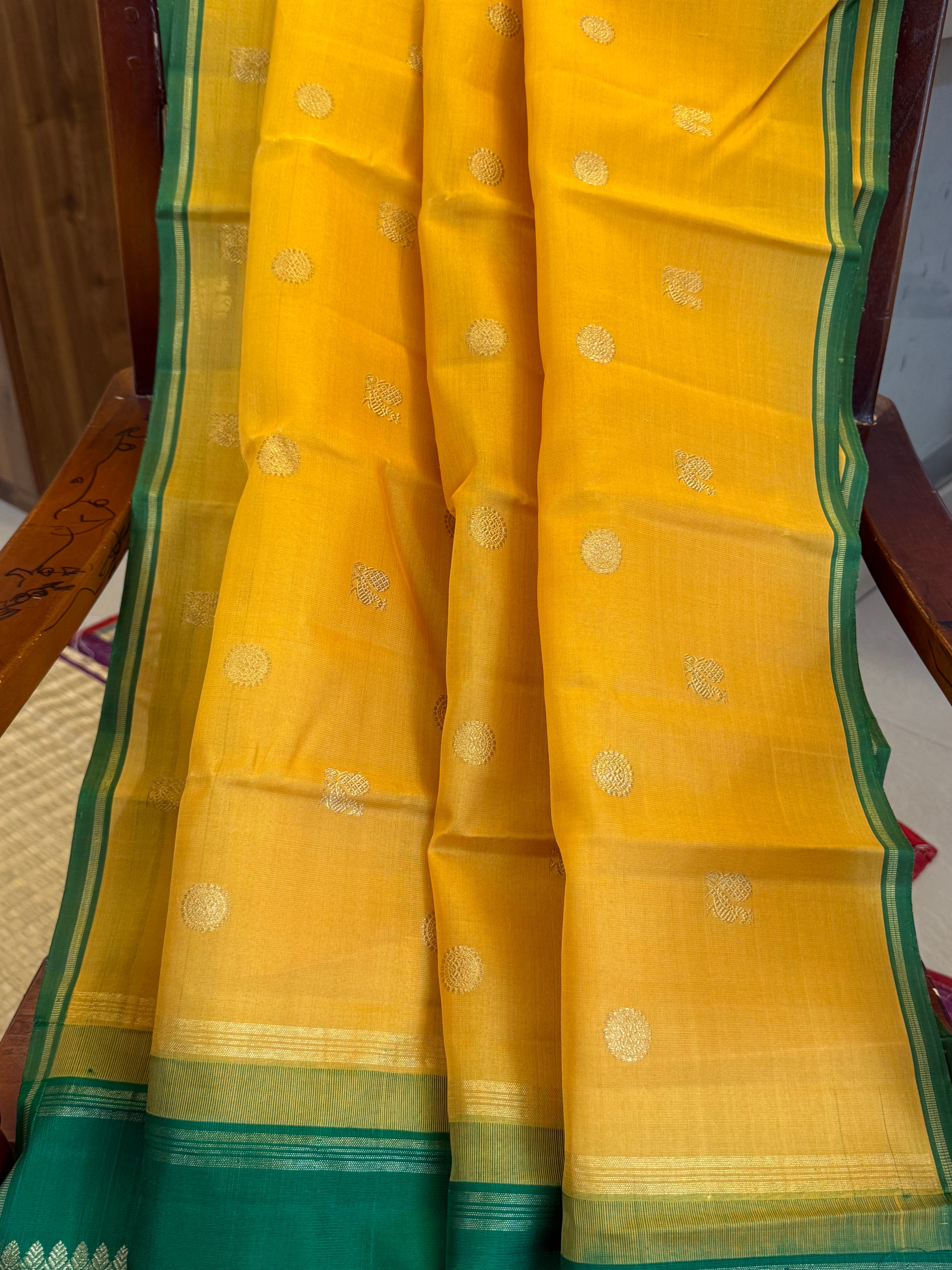 Mustard yellow with green Organza border less saree
