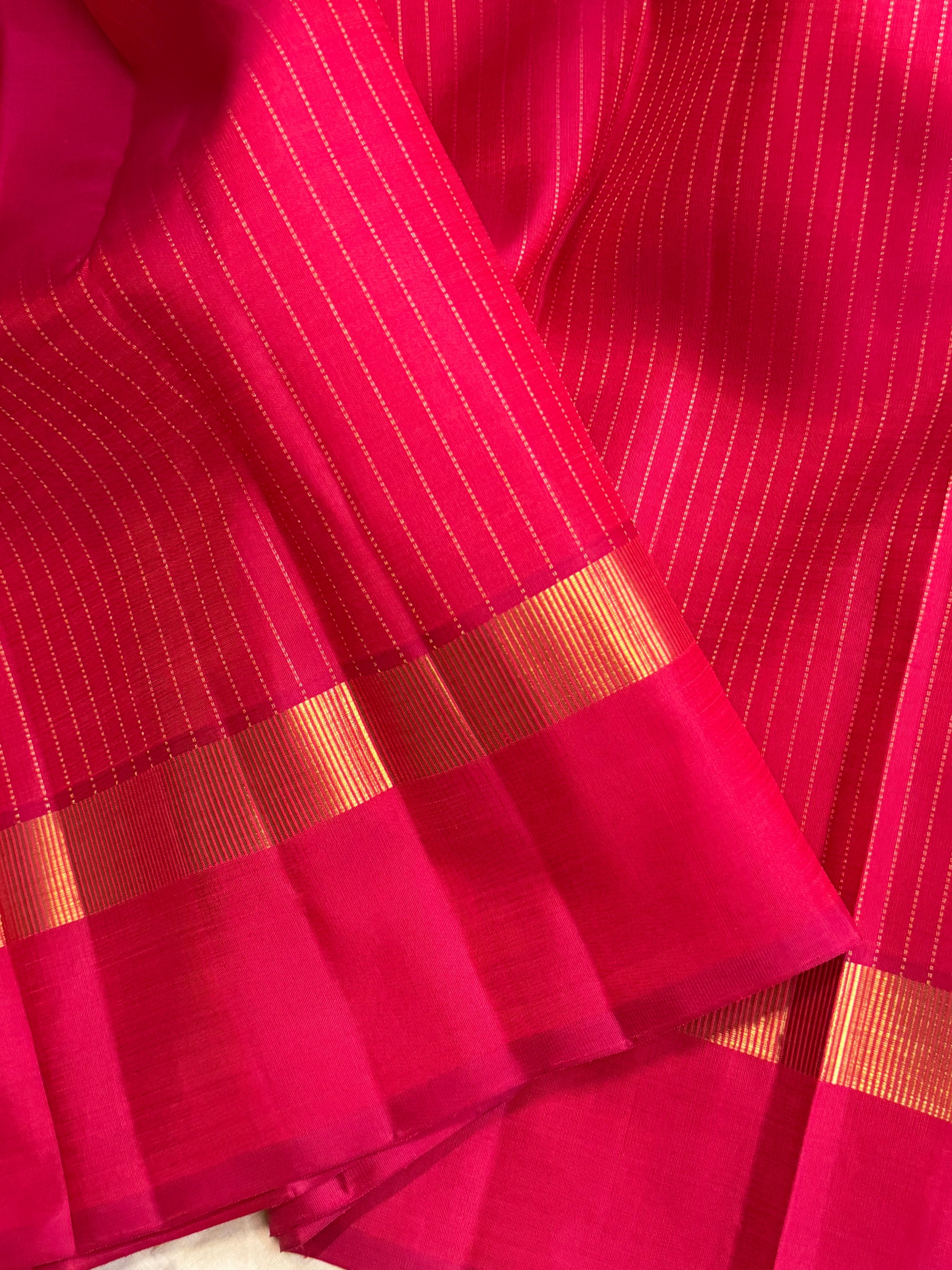 Pinkish red oosi zari lines kaal erangina border/ Kanjipuram silk