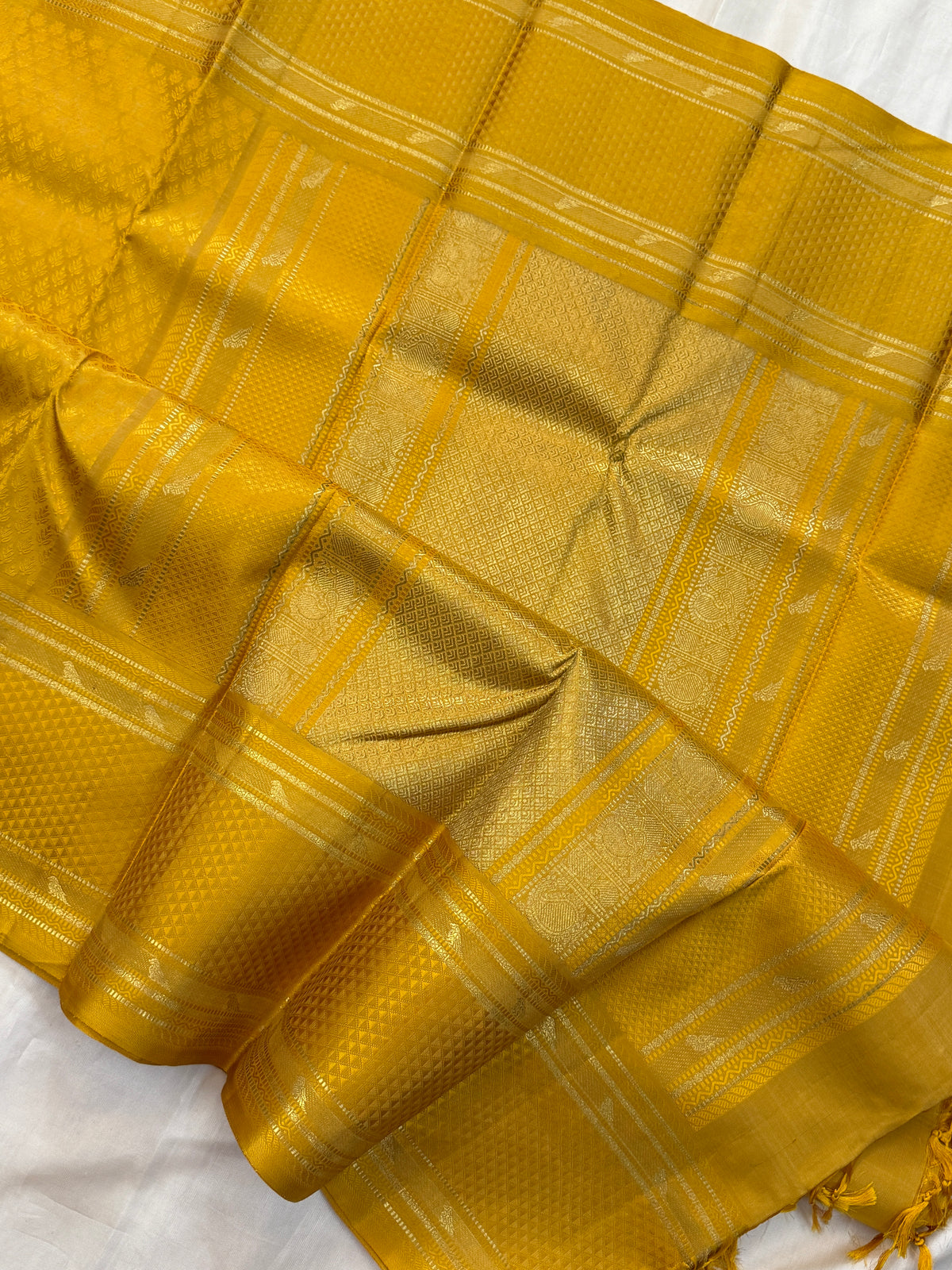KILIYE :  mustard yellow kili  work /Kanjipuram silk saree
