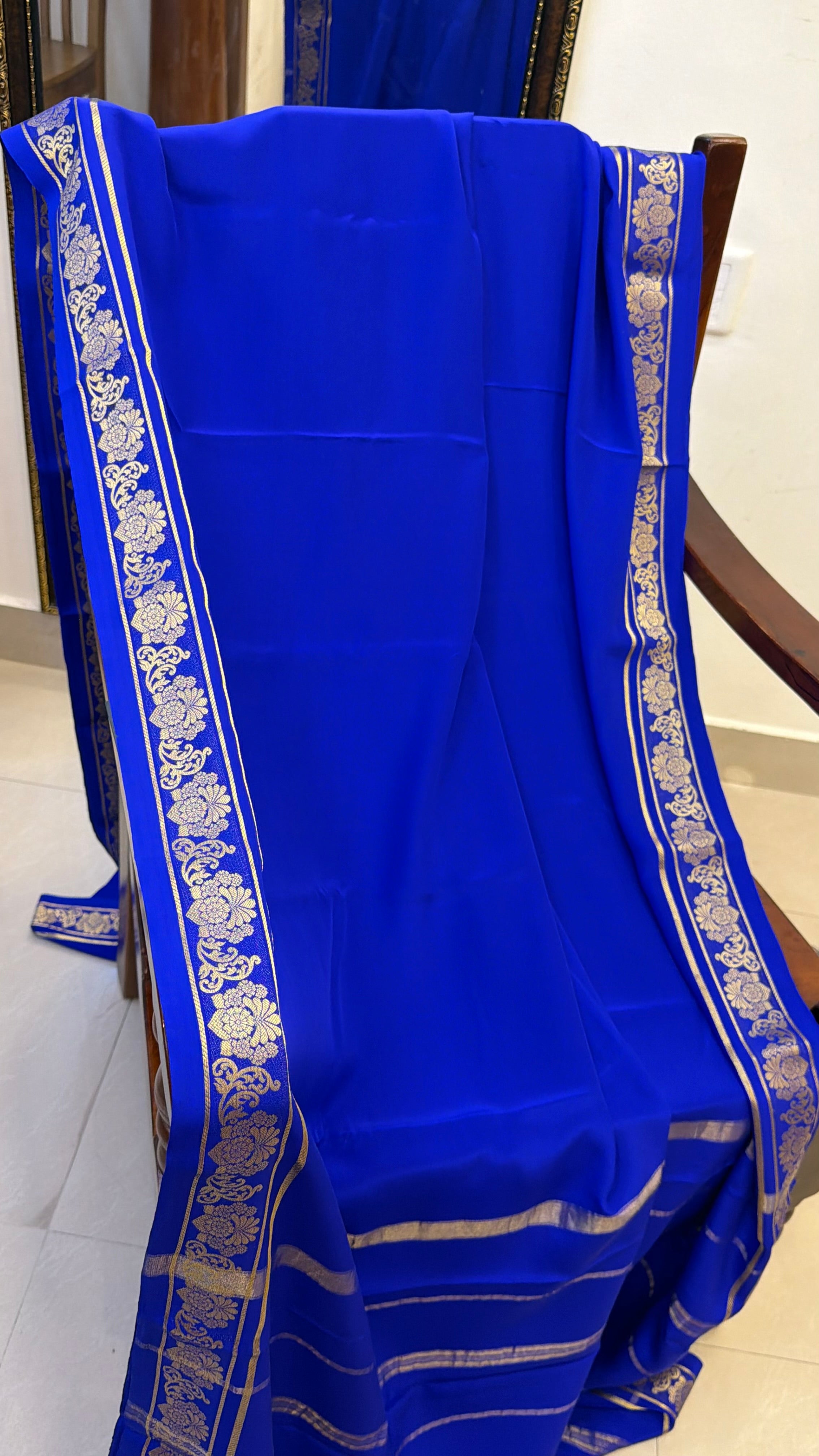 Floral border ms blue Pure crepe silk saree