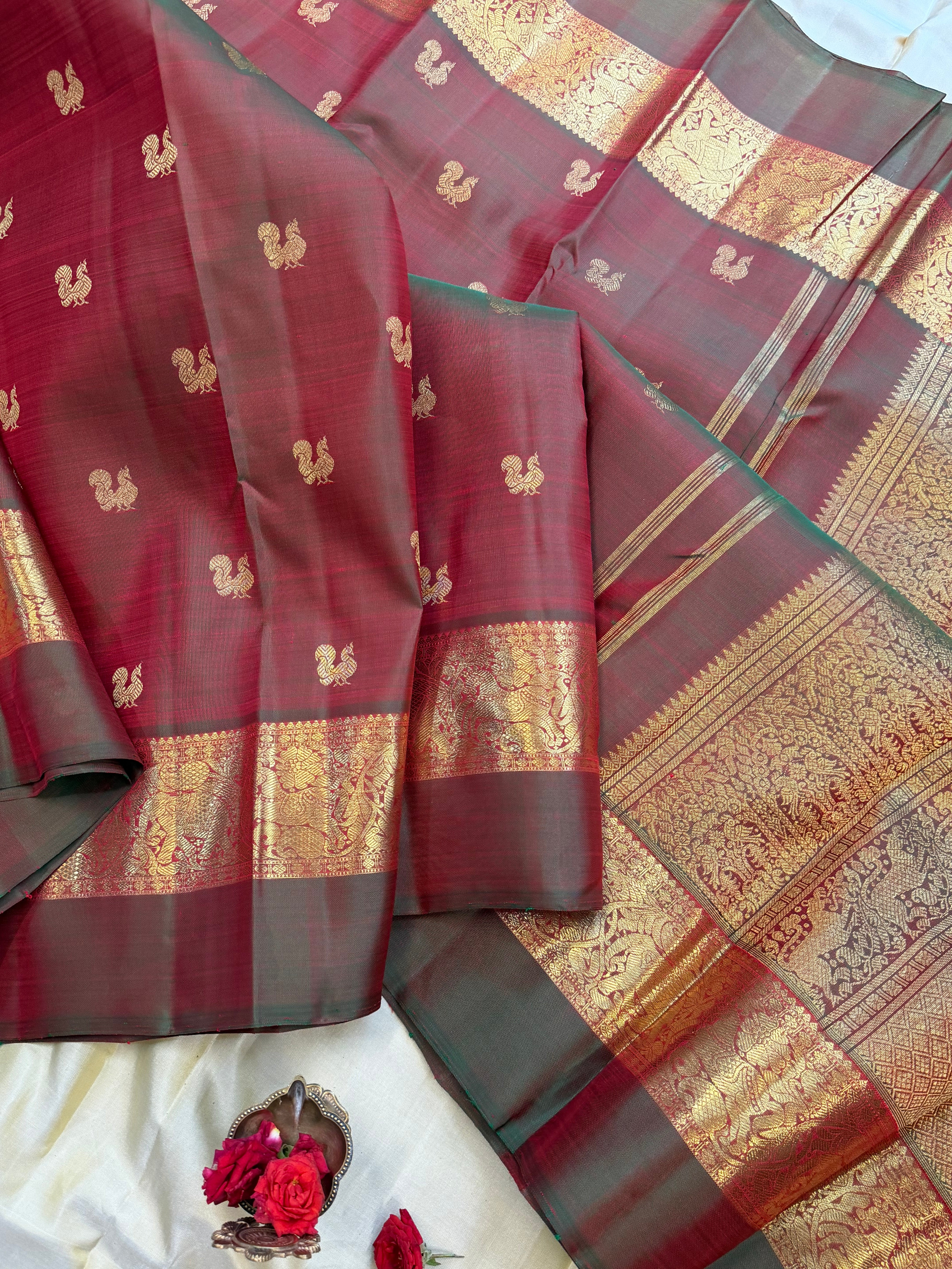 Mann : kaal erangina border earthy hues in pure Zari Kanjipuram silk