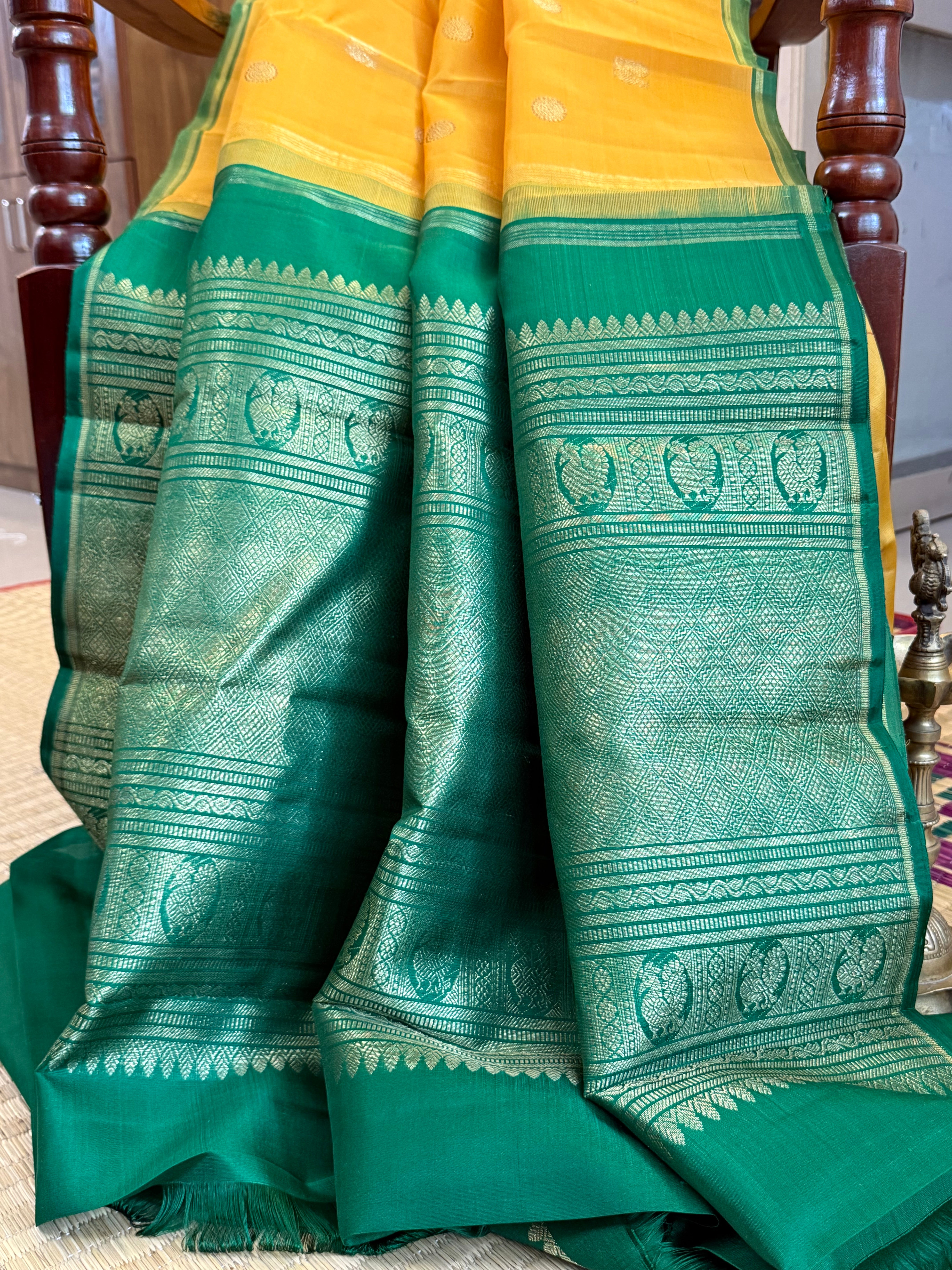 Mustard yellow with green Organza border less saree