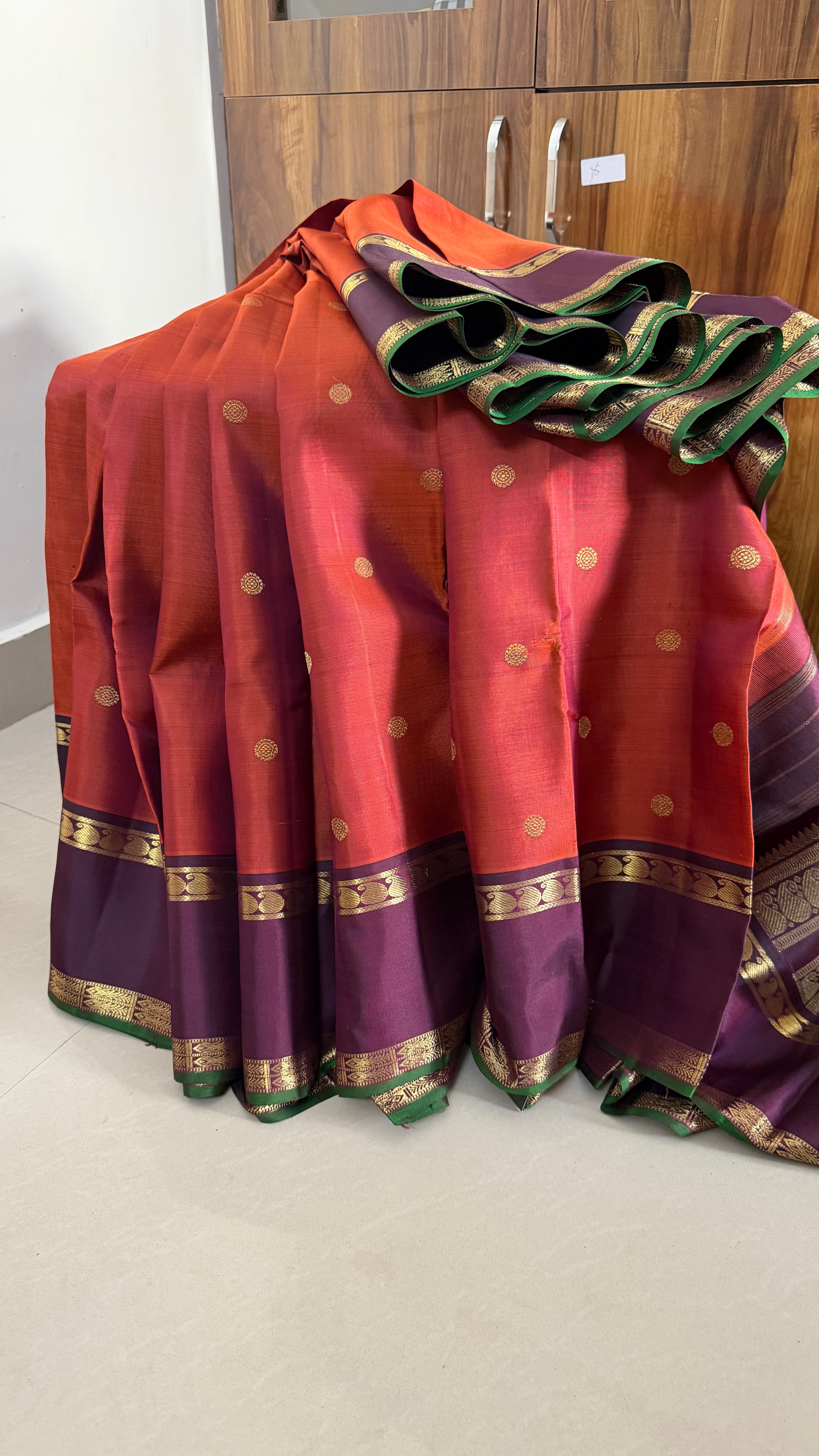 Rust with Paaku border /kanjipuram silk