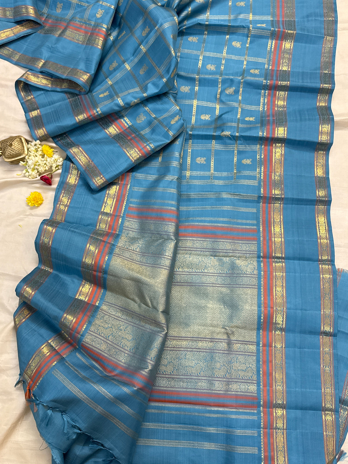 Master weaver- pastel powder blue kattam Iruthalaipakshi butta adai woven/ Kanjipuram silk