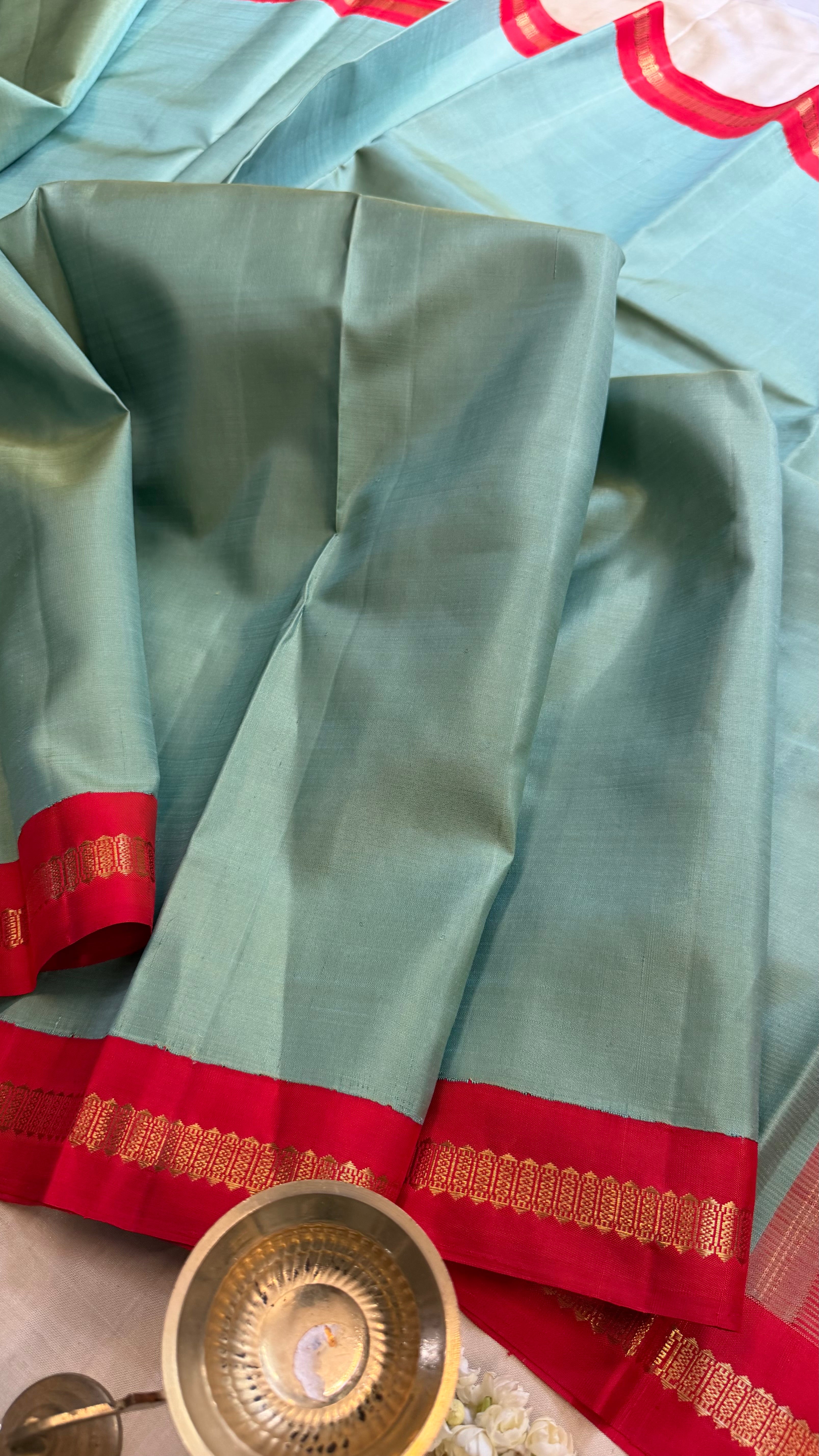 Master weaver - Elakai green and red kai korvai/ Kanjipuram Silk