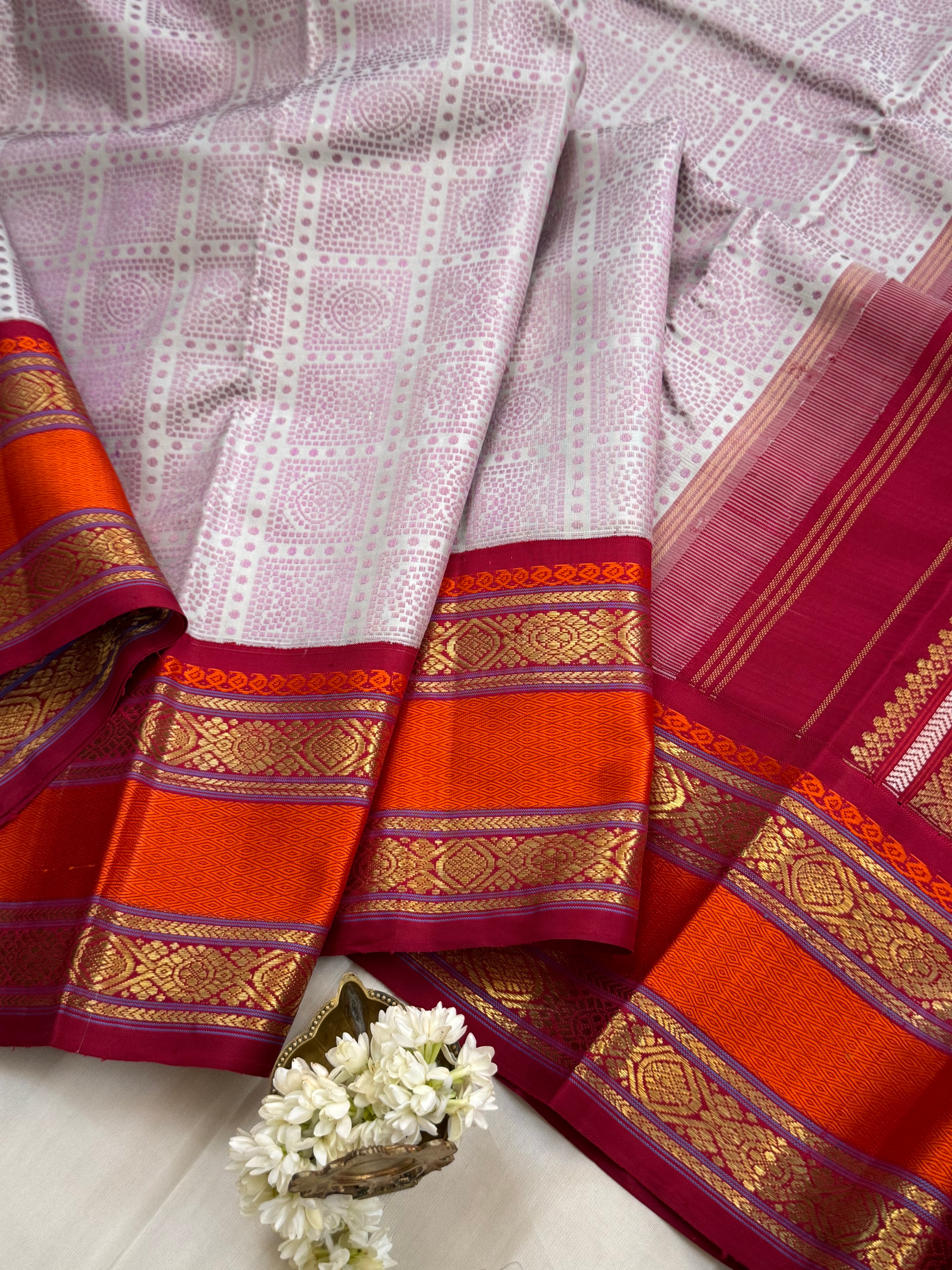 Bandhini Butta retta pet Korvai master weaver  Kanjipuram silk