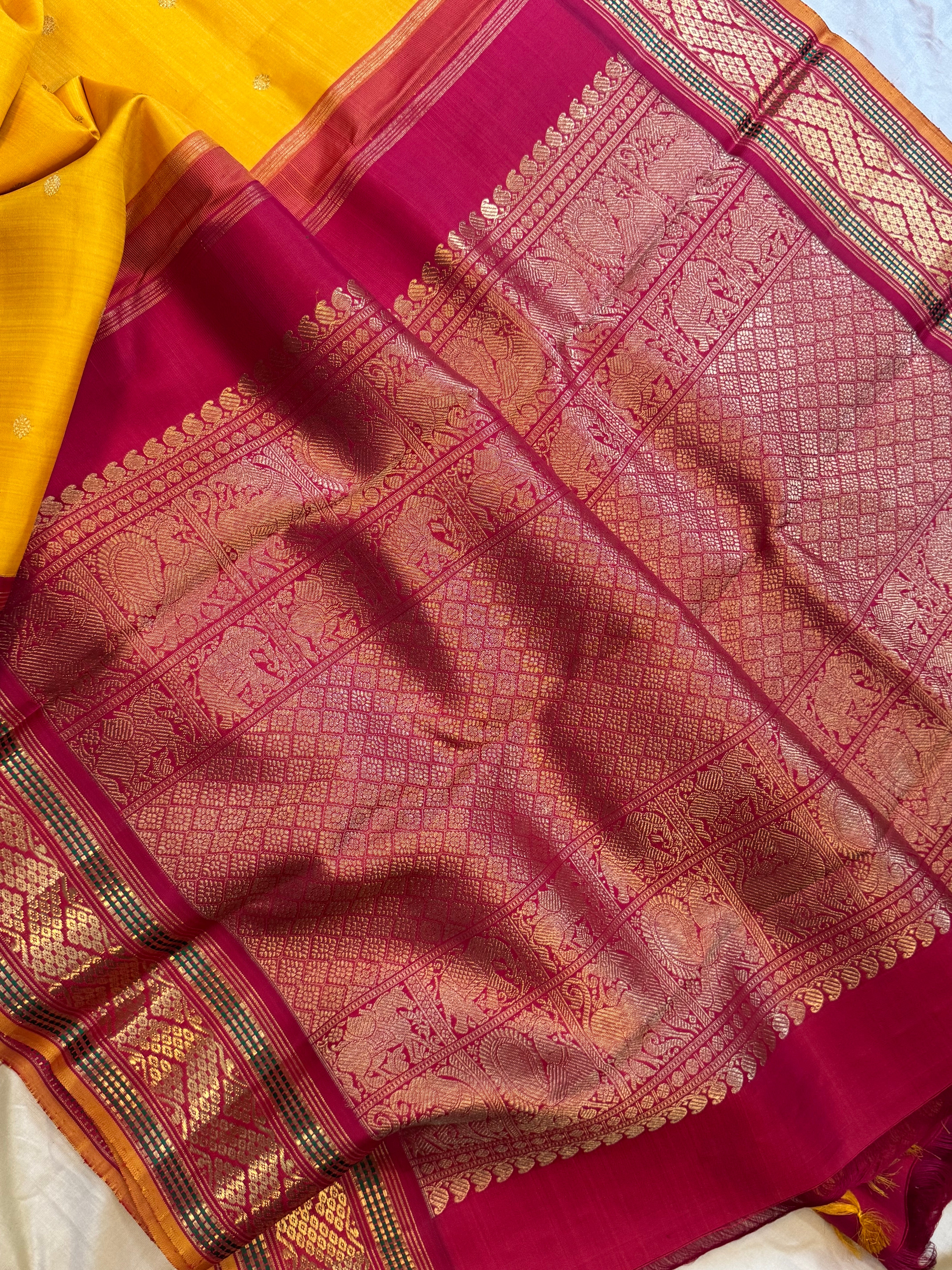 Mustard yellow vintage style adai pet kanjipuram silk.