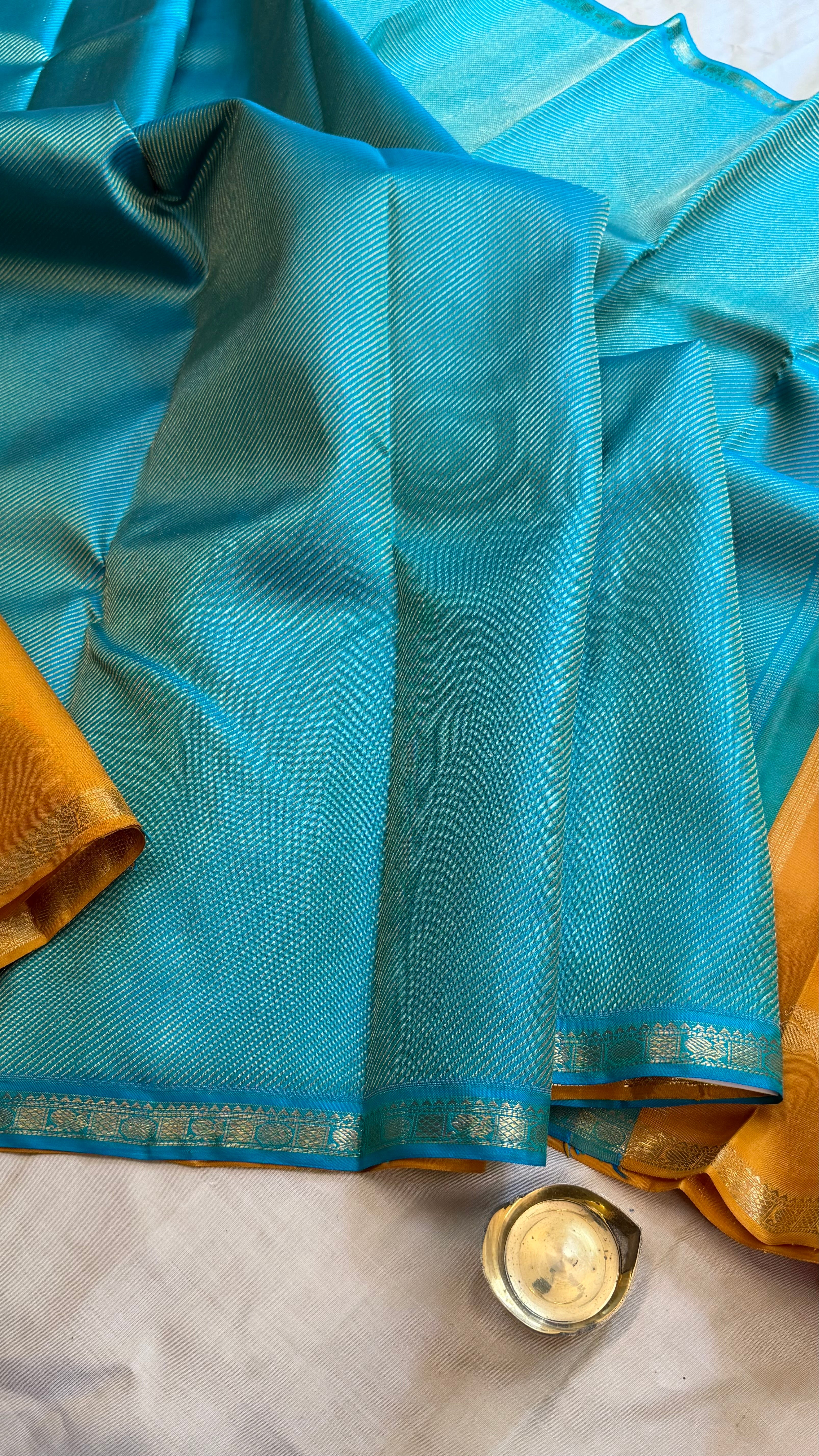 Golden mustard and turquoise blue lehariya partly pallu style - kanjipuram silk