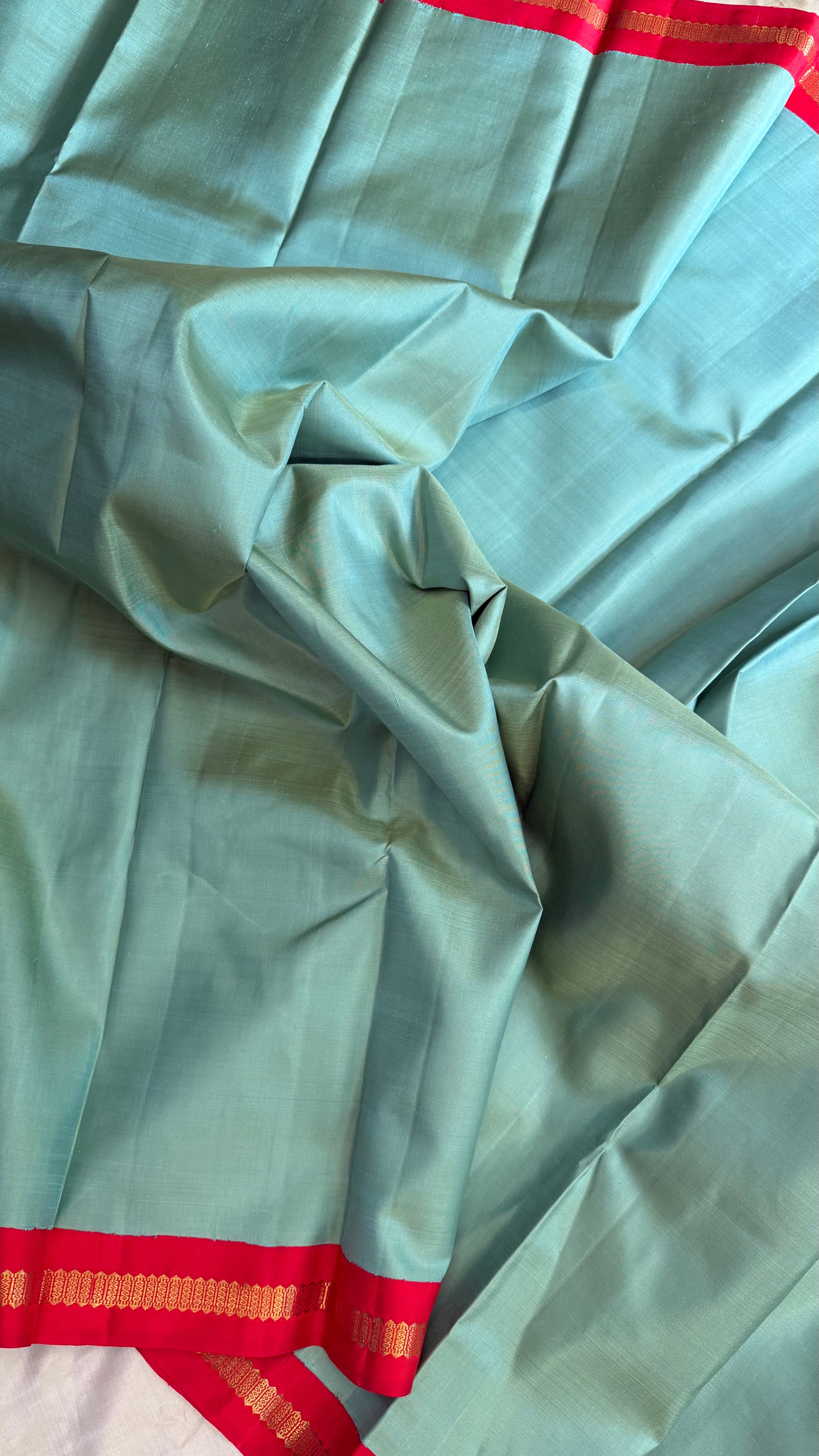 Master weaver - Elakai green and red kai korvai/ Kanjipuram Silk