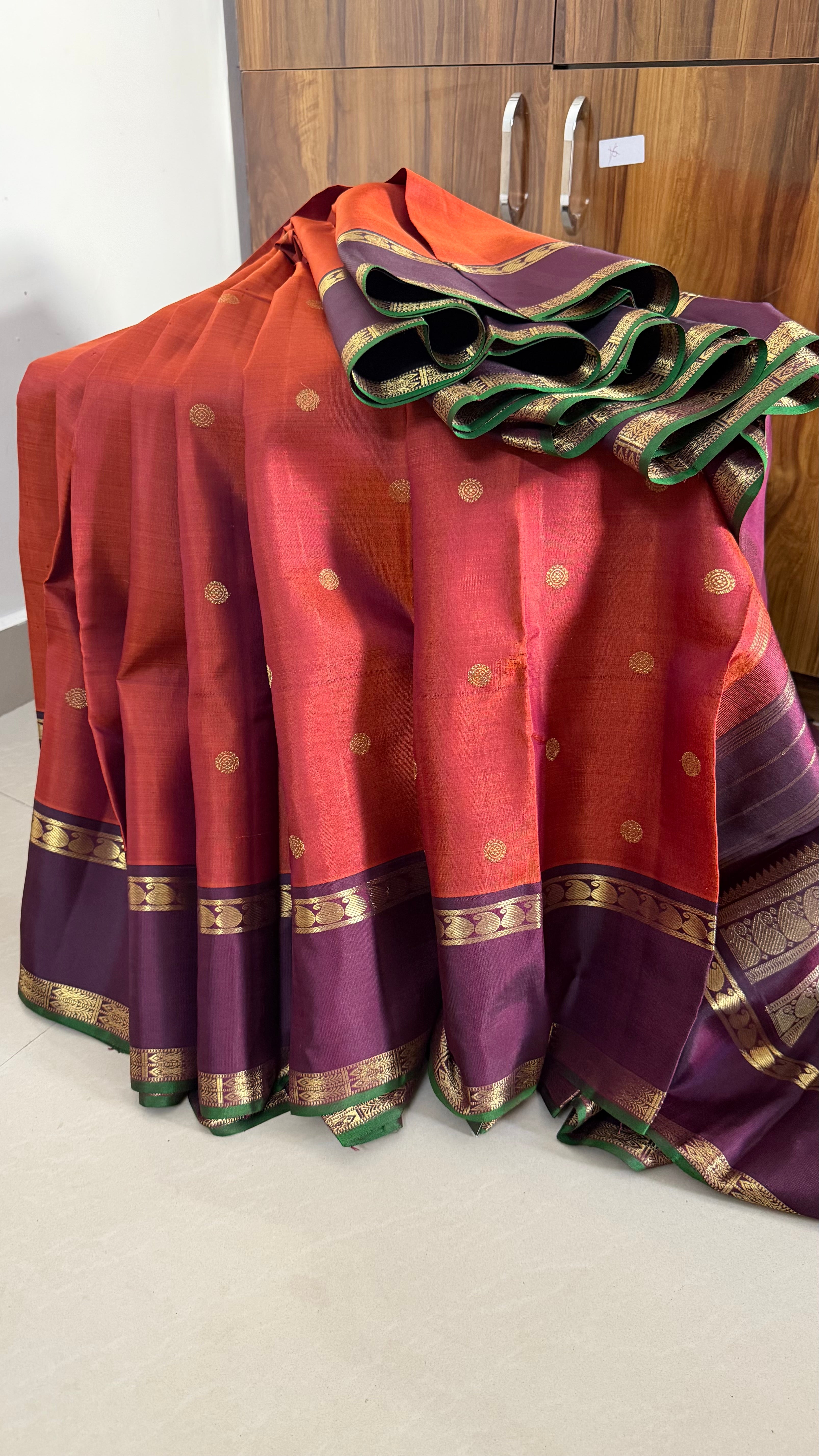 Rust with Paaku border /kanjipuram silk