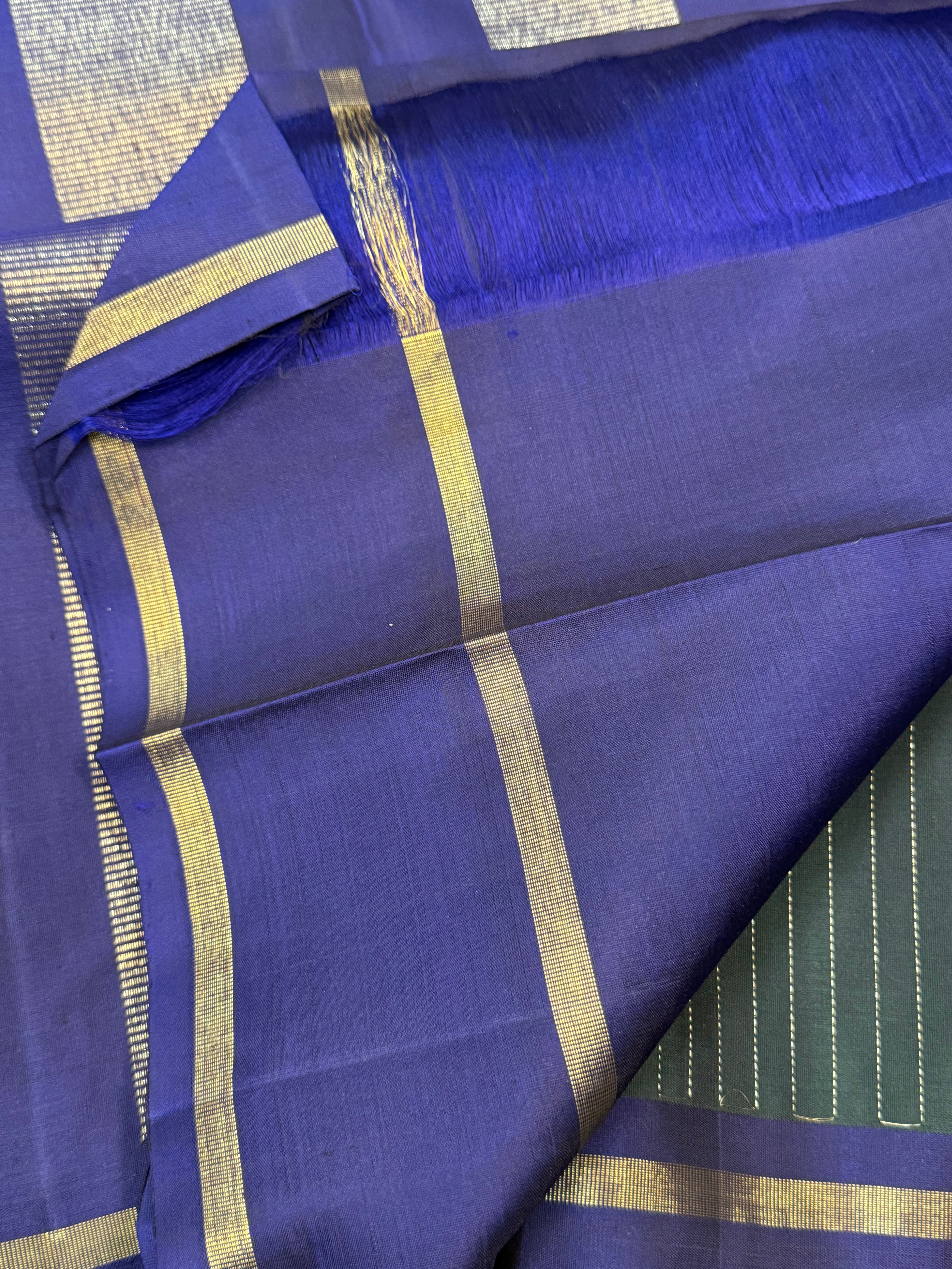 Dark green and violet oosi stripes border butta / Kanjipuram silk